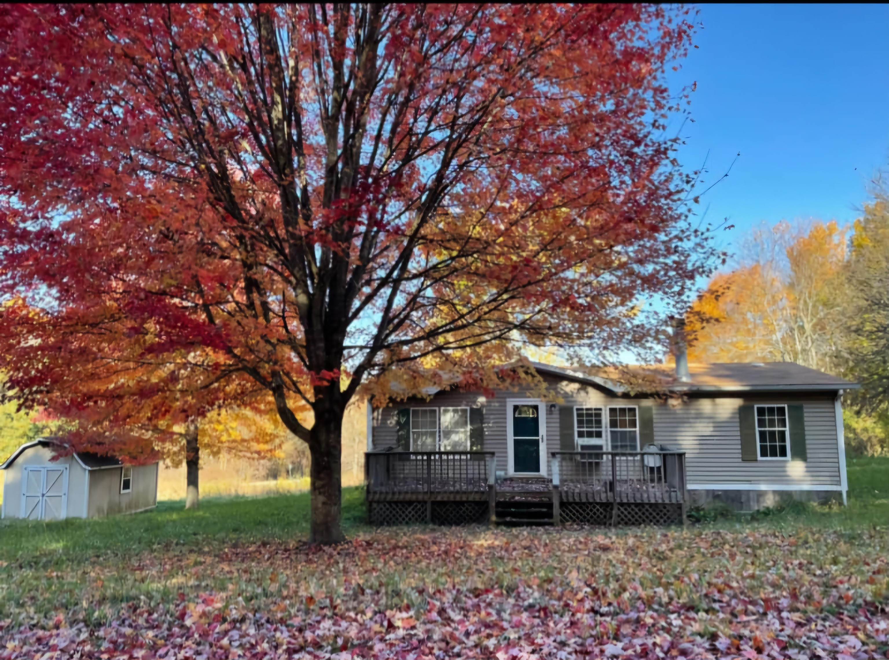 Come see this spacious easily maintained property with a flat yard, circle drive, and inviting front porch. This 3 bedroom 2 bath home sits on a .33 acre corner lot and is only 15 minutes from the town of Floyd. The property does have a shared well and the well pump was replaced with new in 2022. The heat pump has been recently serviced and running great. Schedule your private showing today! Current engineering report reflects permanent foundation, government loans welcomed.