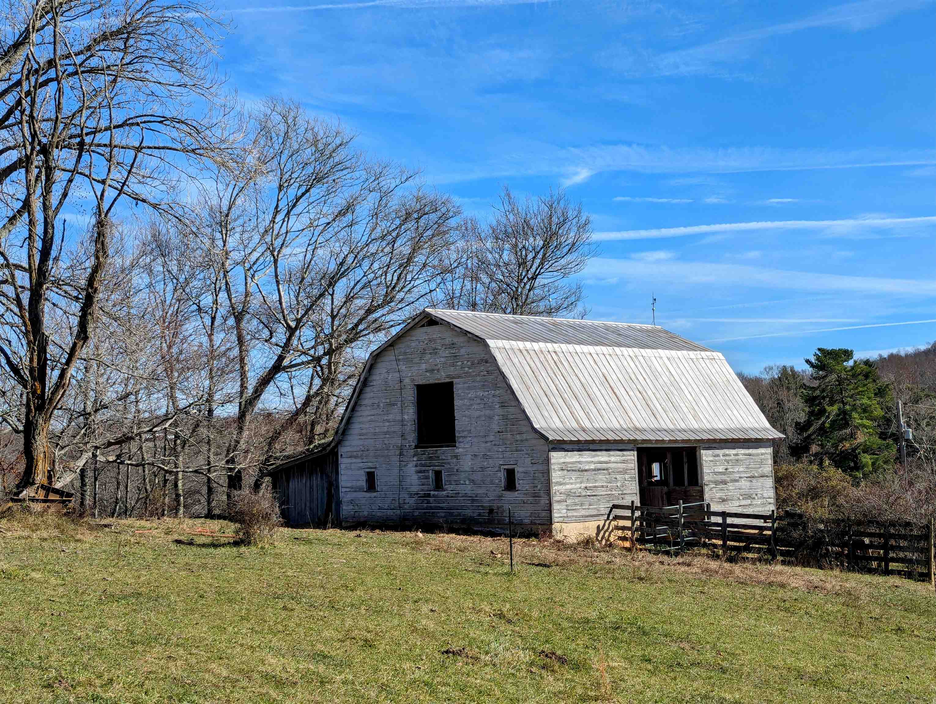 Just over 25 acres of well fenced pasture and beautiful country views in the heart of Willis VA.  This property has recently been upgraded with new interior cross fencing, electricity, well and 3 water boxes.   The large barn offers a lot of opportunities depending on your farming or non farming desires.  Located on state maintained primary road with plenty of frontage.  Build your home on the ridge overlooking your farmstead operation!