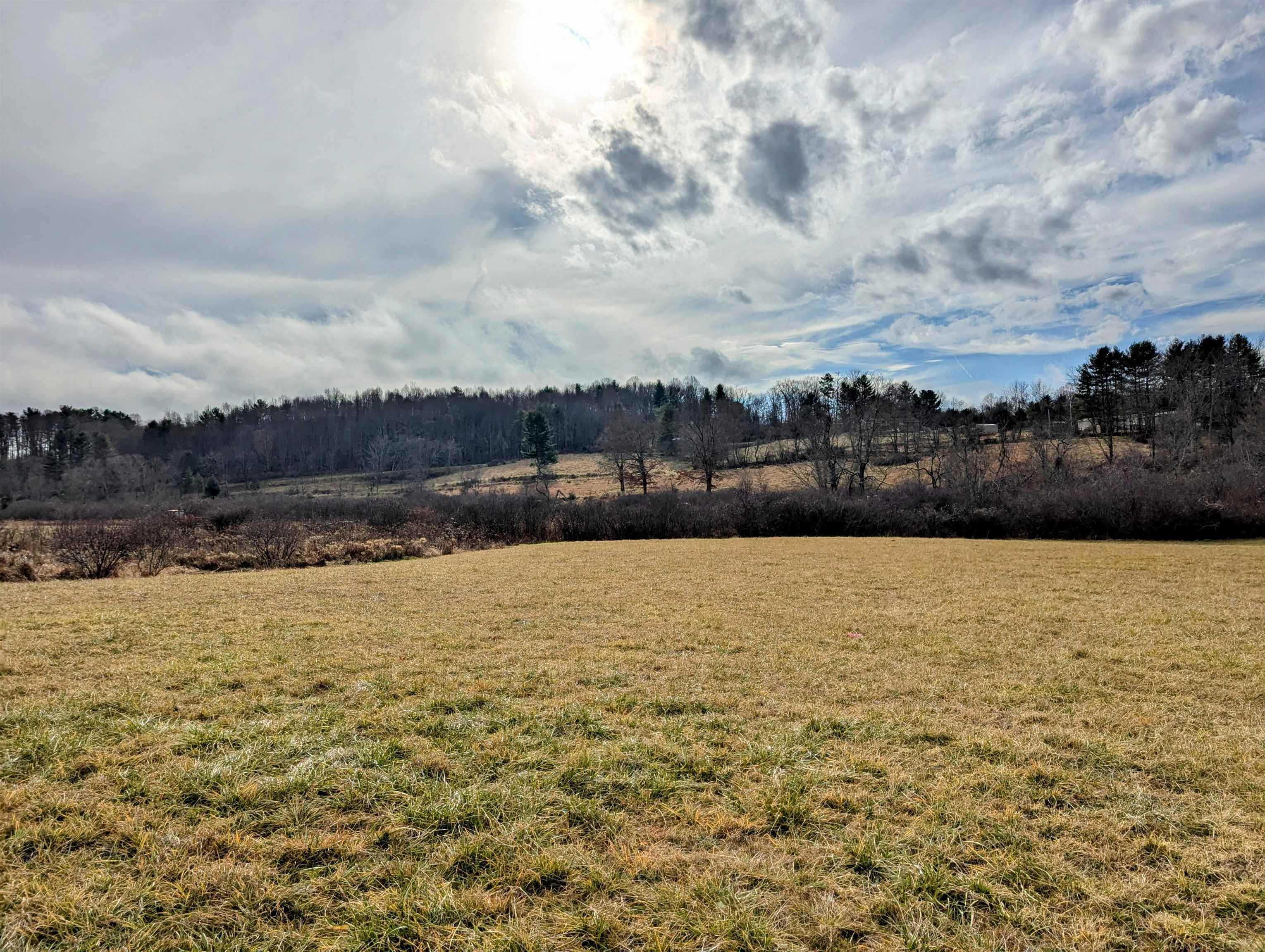 10.5 +/- acres in Willis VA.  Property offers frontage on two state maintained roads, Mira Fork & Shady Grove Rd.   Mira Fork creek flows through the property and offers a mixture of open and wooded acreage.  Bottom land by creek is open cleared pasture / mowing field.  Property is comprised of 3 individual tax parcels making up the 10.5 acres, surveys on record.  Shed is on the property along the Mira Fork road frontage.  Seller will consider owner financing options. Property is approximately 20 minutes from both Floyd and Hillsville VA.