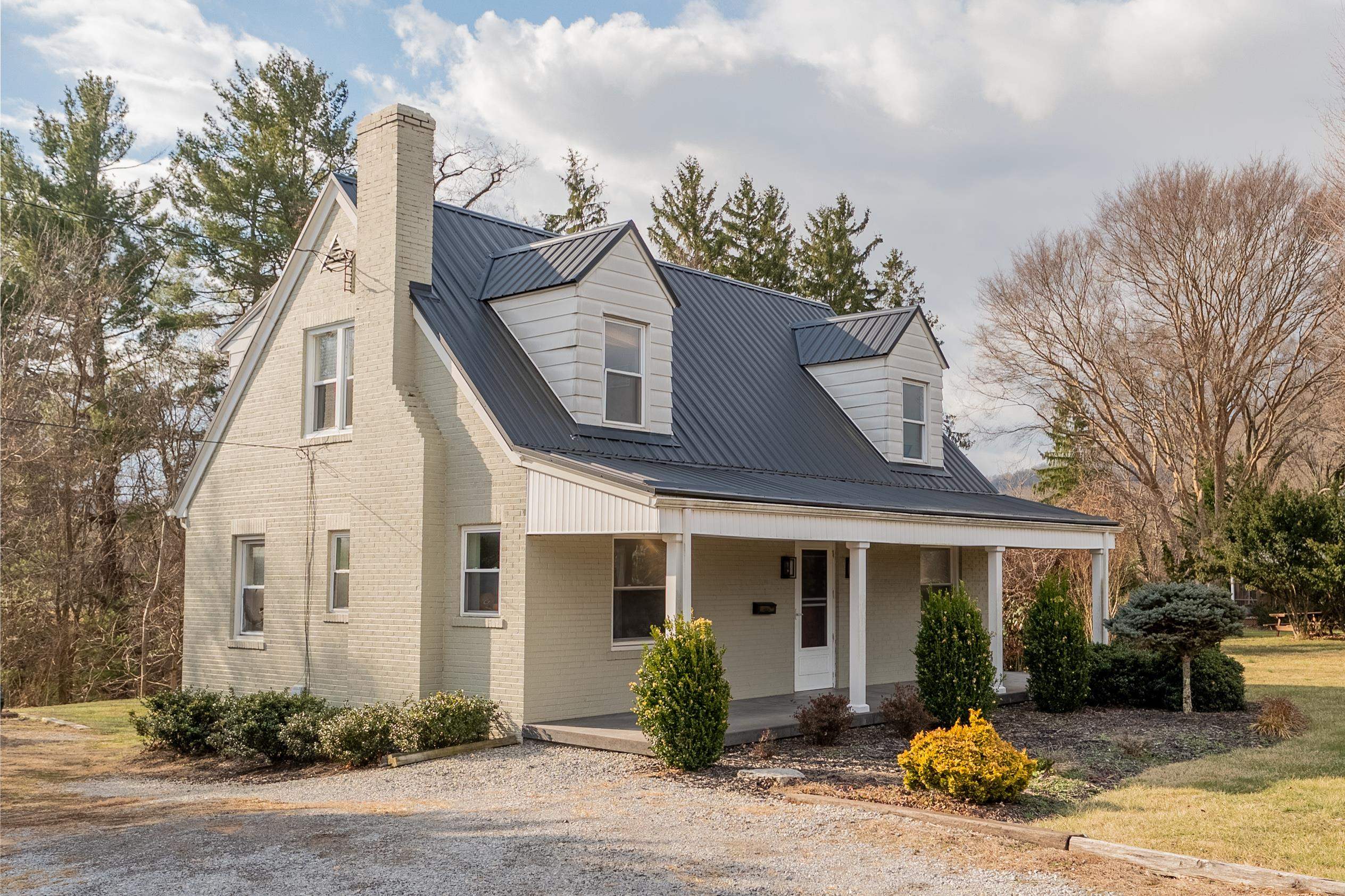 Don't miss your opportunity on this well maintained, 3 bed/2 bath Cape Cod. Located on 1.1 acres in the heart of Town and within to walking/driving distance to restaurants, shopping, the library and much more. Enter in from the covered front porch to the living room area with built-in bookshelves & a wood burning Fireplace. Throughout the main, you will find beautiful hardwood floors. Also on the main is the dining room with 3 built-in cabinets, a bedroom, full bath and a spacious kitchen with an eat-in area. Off of the eat-in area is the great sized back deck. This will be a great spot to relax and/or entertain guests. On the upper level, you will find 2 additional bedrooms and a full bath. The basement will be a great area for storage or potential to add more square footage. Roof was replaced in 2016, Heat Pumps installed in 2023. Call today to schedule your showing.