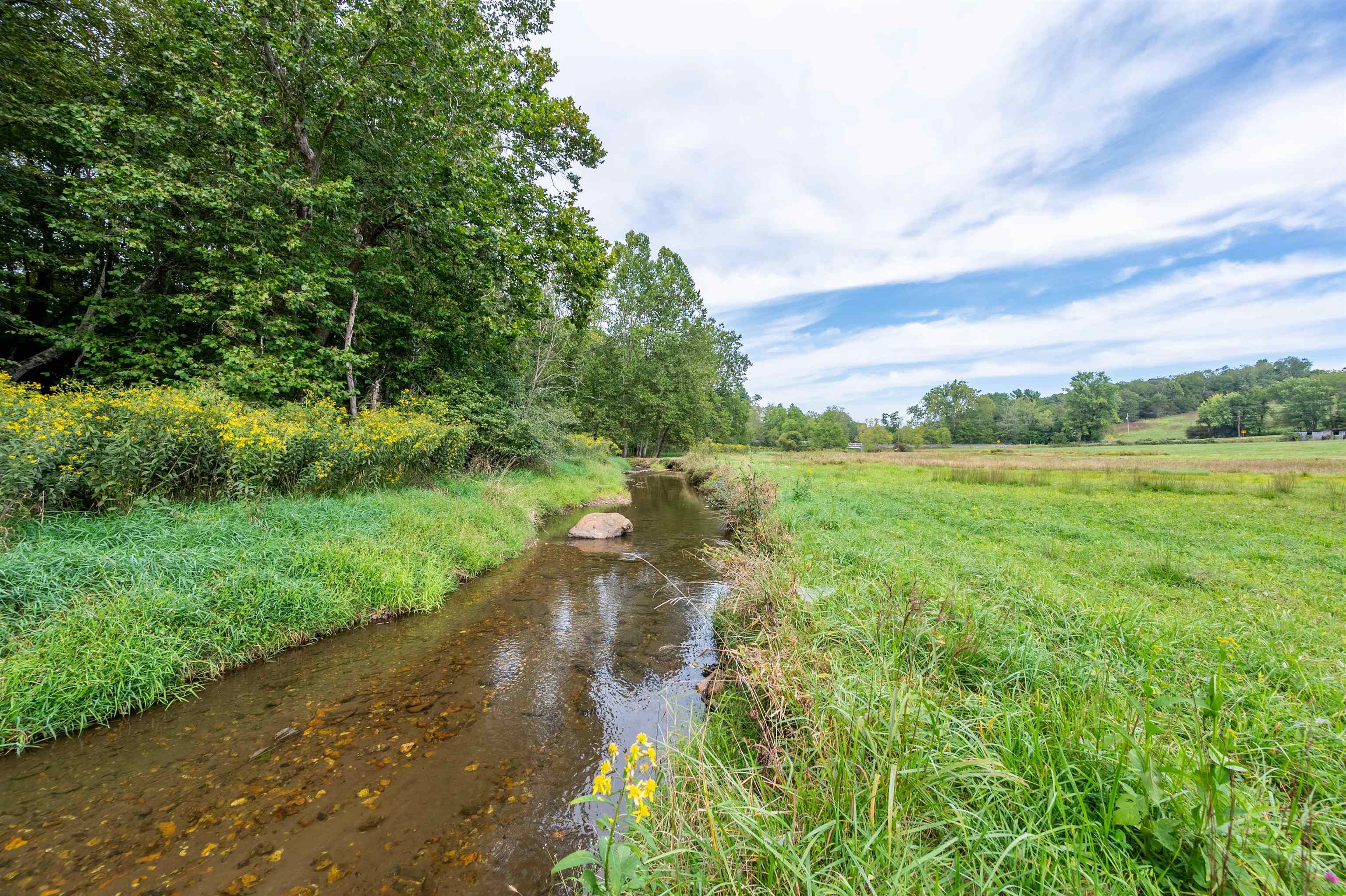 Discover a rare opportunity to own extensive river frontage along the West Fork of the Little River in a peaceful and picturesque setting. This beautiful tract of land offers a level-laying landscape, ready to be manicured to your liking, whether for a dream home, a private retreat, or recreational enjoyment.  This property has been perk tested for a 3-bedroom home, making it an excellent homesite with the serenity of the river at your doorstep. Conveniently located with easy access to Floyd, you'll enjoy the perfect blend of seclusion and accessibility.  Looking for more land? Additional acreage is available! This listing is part of a 3-tract offering, allowing for expansion or investment opportunities.  Don’t miss your chance to own a slice of riverfront paradise—schedule your showing today!