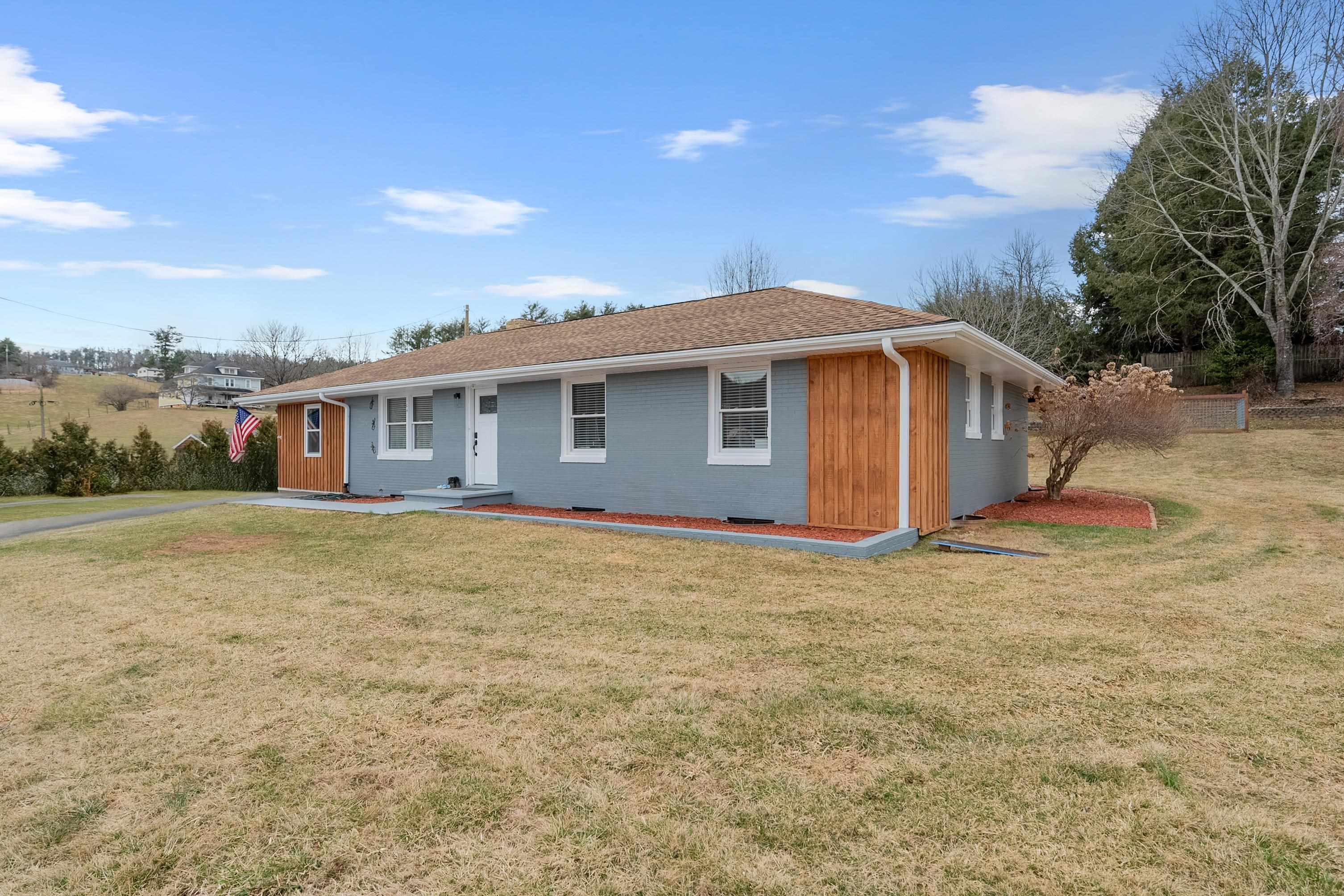 Welcome to this beautifully remodeled ranch-style home nestled in the heart of Galax, VA! Situated on a 0.36-acre lot within town limits, this spacious 5-bedroom, 2.5-bathroom home offers modern updates, small town charm, and local convenience. Step inside to discover a bright and airy living space with fresh finishes throughout. The home features a new kitchen, remodeled bathrooms, spacious bedrooms, new plumbing including a water heater, new doors, fixtures, and an efficient floor plan. With a full, unfinished basement, there’s ample storage space or potential for future expansion or bonus rooms. Outside, you’ll find a fenced dog run with a dog house combined as a storage shed. Enjoy quality landscaping on this easily maintainable property situated on a dead-end street. This move-in ready home is ideal for folks at any stage of life and offers a seamless and affordable transition for the next owner. Minutes to schools, shops, and recreational attractions. Call today to see this Gem!