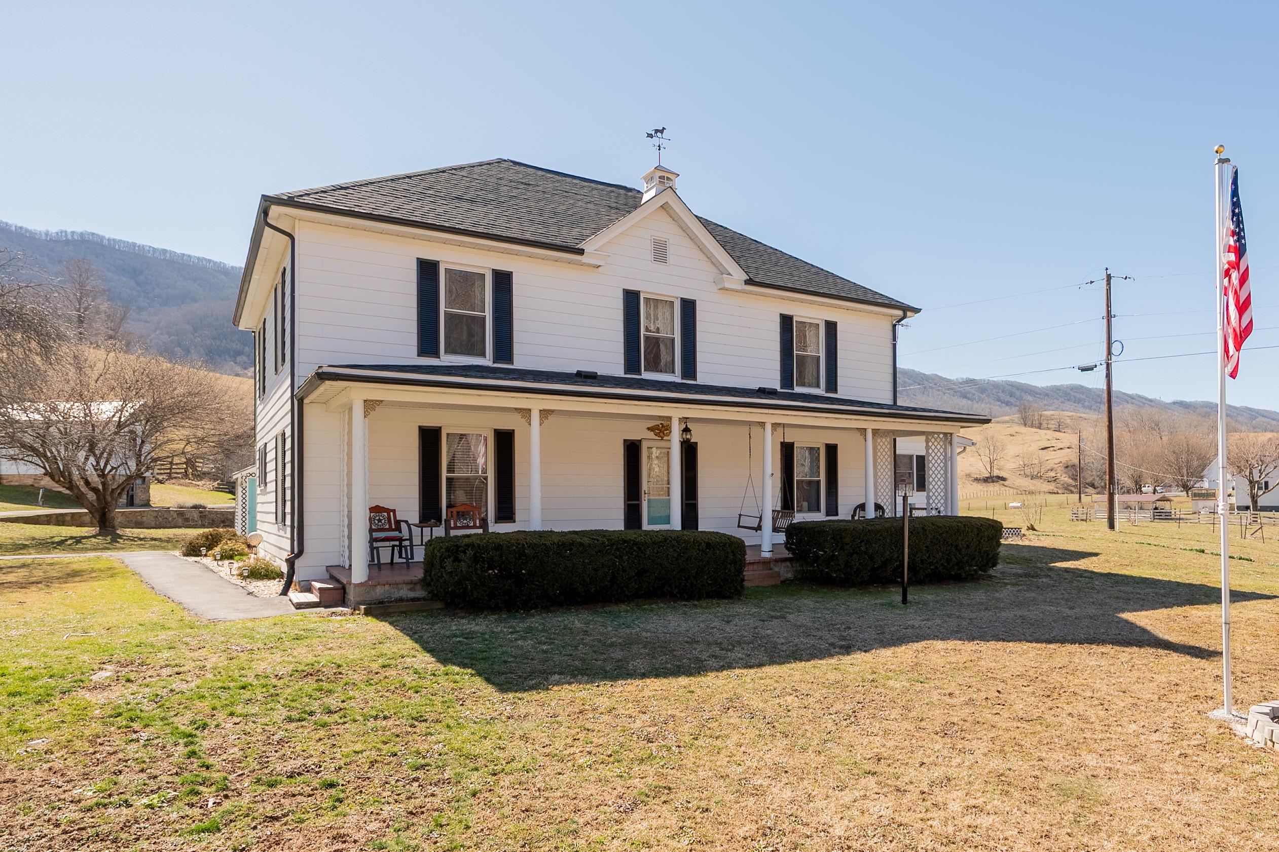 Don't miss your opportunity to own this gorgeous 6 BR 2 BA farm house with frontage on Clear Fork Creek in Bland County, VA! Home was built in 1900 and sets on a very nice, level lot consisting of +/-0.77 acres. Survey on file. Home features include the laundry on the main level, a Generac whole house generator, updated kitchen, laundry room, and bathrooms, nice open deck overlooking the creek and front covered porch, insulated tilt windows, vinyl, laminate wood, vinyl plank and original hardwood flooring, and some baseboard heat as well as mini splits for heating and cooling. Dishwasher, oven, fridge, washer and dryer all included. Also included are outbuildings along with an extra large garage big enough for 2 vehicles and plenty of room left over for storage or to make a workshop. Two wells on property. New shingle roof in 2022. Exterior was painted just a few years ago as well. Paved driveway and street/state maintained road frontage. This home is move in ready!