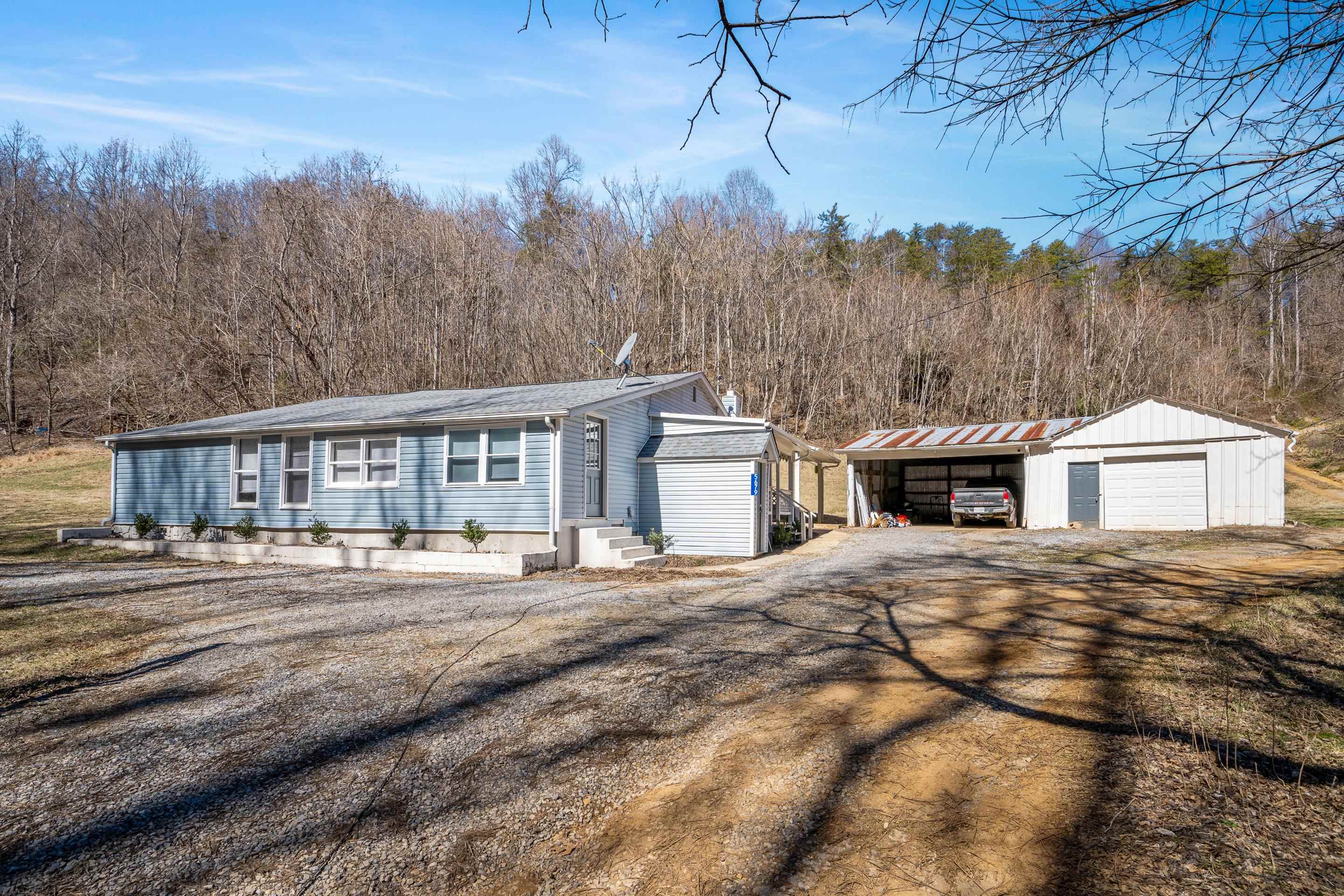 Nestled on 10 acres of serene countryside, this charming 1,638 sq. ft. home offers 3 bedrooms, 2 bathrooms, and endless possibilities. Recently updated, it features a spacious living area, modern kitchen, and ample storage throughout. The detached garage and additional storage buildings provide plenty of room for equipment, tools, or hobby space. Zoned for agriculture, this property is perfect for a hobby farm, with room for gardens, livestock, or recreational activities. Enjoy the peace of rural living while still being conveniently located near amenities. Don’t miss this opportunity to own your own slice of country paradise!