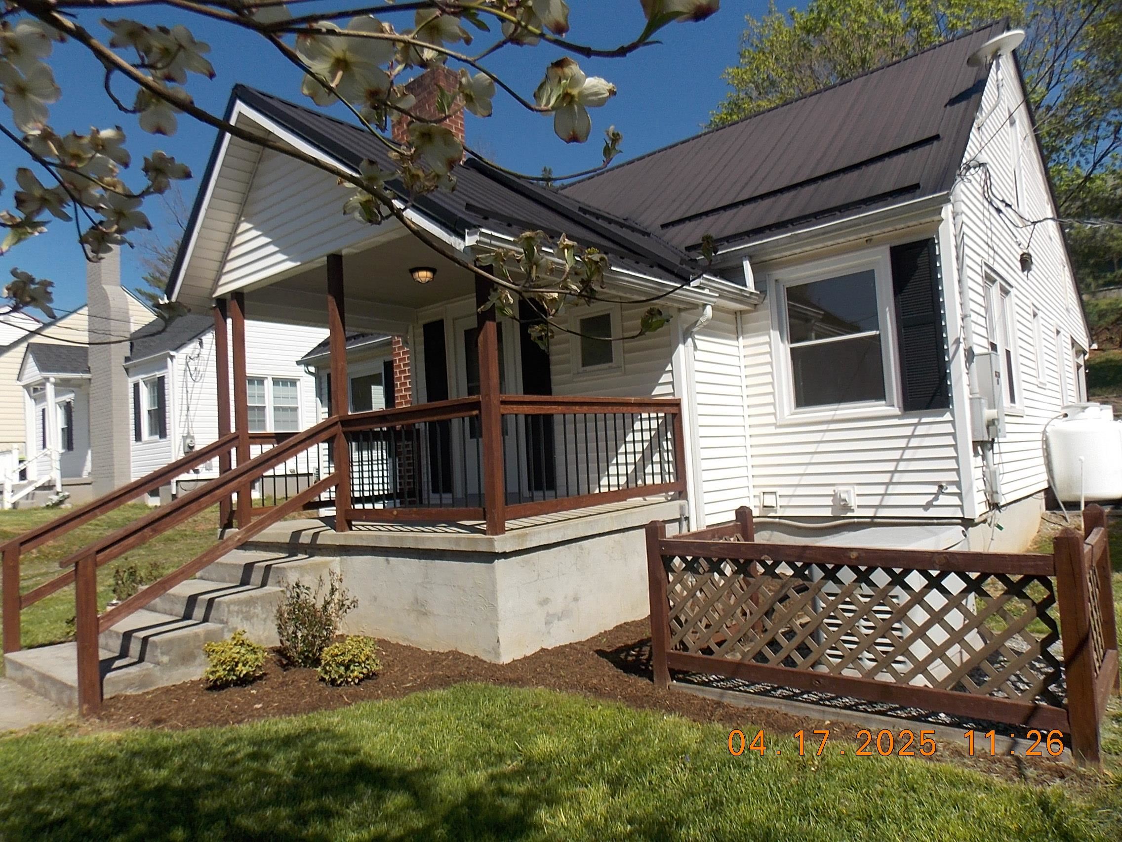 Come see this cute little keeper. Four bedrooms, living room fireplace, new kitchen, new bath and many other features. Extra nice sunroom with lots of windows for nature viewing in backyard. Separate mini split hvac unit which helps cool & or heat the house as well as sunroom. Family area in basement with brick hearth with flu for woodstove. Ceramic tiled basement shower. 20,000 kilowatt whole house generator with two owner owned propane tanks. Hardwood floors add to the beauty & charm. Metal roof, off street parking, and a nice front porch for relaxing. Don't miss your opportunity.