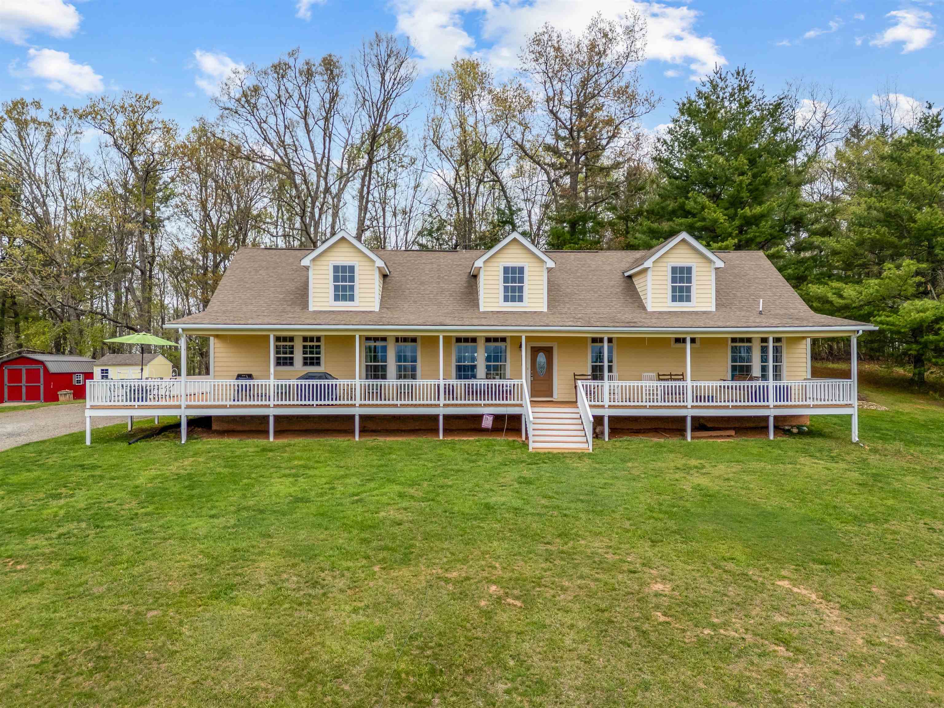 This beautifully maintained 6 bed, 4 bath Cape Cod home in Galax’s sought-after Baywood community offers 3,581 sq ft of living space on 1.676 acres. Built in 2007 as a true off-frame modular, the home features a stunning wrap-around deck with incredible views and is less than a mile from the scenic New River. With two outbuildings and ample space for entertaining, this property blends charm and functionality. Enjoy a peaceful, private setting while being centrally located—about an hour from Winston-Salem, NC and Blacksburg, VA, and within two hours of Roanoke, Greensboro, Bristol, High Point, and Charlotte. Whether you're looking for a peaceful full-time residence or a spacious mountain retreat, this home checks every box. It’s not often you find a property of this size, condition, and setting—complete with views, acreage, and location. Don’t miss the opportunity to make this Baywood beauty your own.