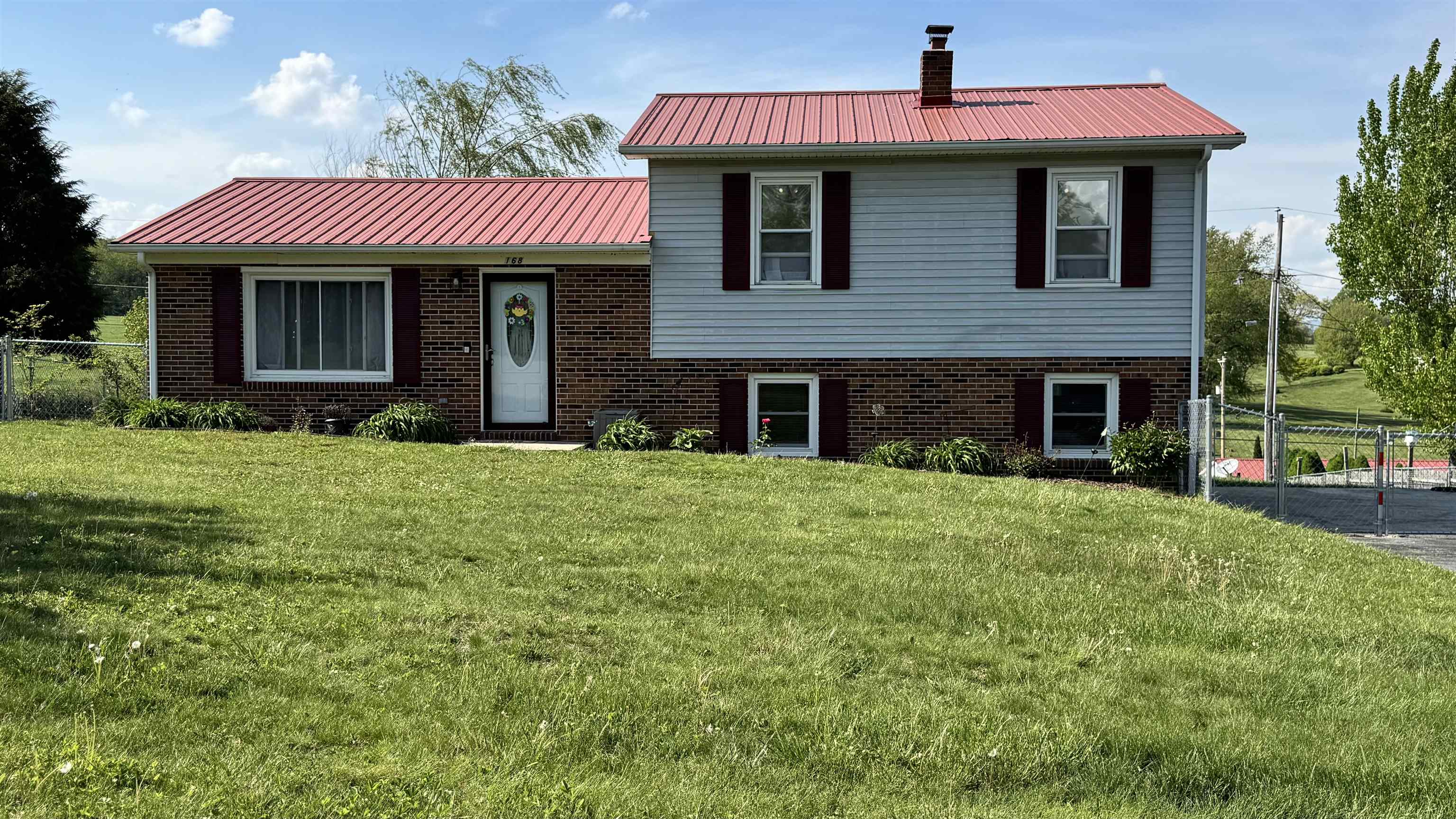 Take look at gem in the Town of Rural Retreat. This classic split foyer sits on 1/3 acre with a fenced in back yard for the pets to enjoy. Other improvements include new carpet, new light fixtures, new paint, new hot water heater, remodeled upstairs bathroom, new vinyl floor, new dishwasher, insulation added to the attic, encapsulated crawl space, and a new patio door to the back yard. Nice amenities for this 3BR, 2BA home with room for storage/expansion in the basement. Meticulously maintained, this one is a must see. Take look at the photos and schedule your appointment today!