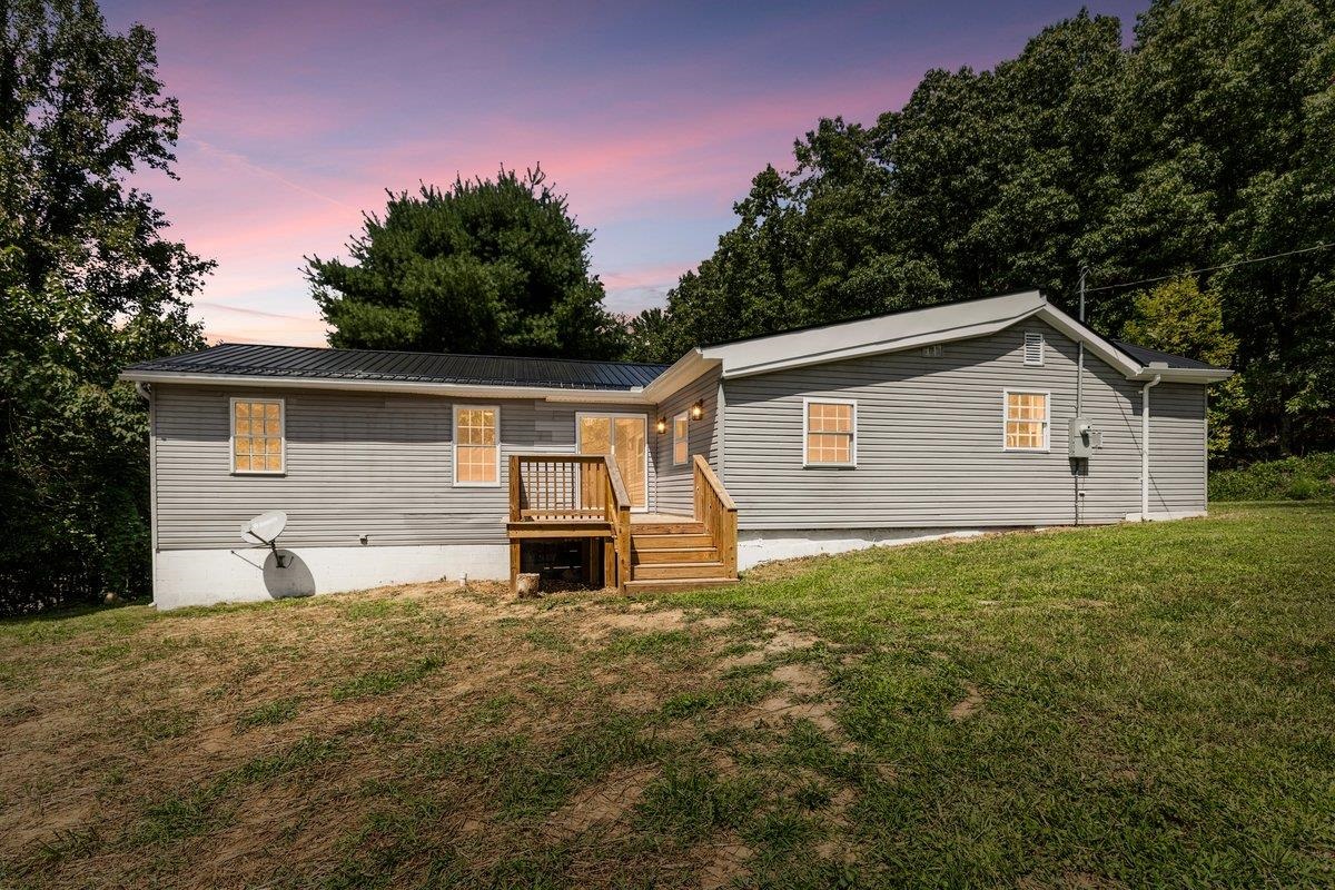 If you are looking for a taste of the country, look no further. This 3 bedroom/2 full bath, one level living ranch has just been completely renovated! You will love the large kitchen with eat in breakfast nook! The great room with vaulted ceilings gives this home the added custom features you are looking for! Enjoy the peaceful neighborhood while being close to town and only minutes from the national forest! Nothing has been left to finish - this move in ready home has it all!
