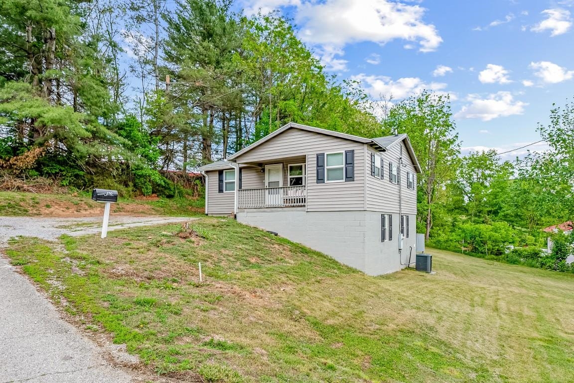 Great things come in small packages! Remodeled gem in the heart of Christiansburg on a double lot = an unbeatable combination of convenience & quality awaiting one lucky buyer! Cozy covered front porch invites you inside to an open floor plan filled with natural light! Enjoy luxury vinyl plank flooring throughout for ease of daily living. An abundance of cabinetry, sparkling countertops & center island aid in meal prep in this well-appointed kitchen. Modern chandelier hangs in the dining nook where you can enjoy morning coffee & family meals with delightful yard views. 3 bedrooms generously sized to match your needs, with the primary getting a private bath. Spiral staircase to the full basement with a finished family room. Additional unfinished space for storage or expansion possibilities. Heat pump, water heater & roof approximately 5 yrs old. Double lot for play, relaxing, gardening! Enjoy peace of mind with the fire dept & rescue squad just across the street. Your search ends here!