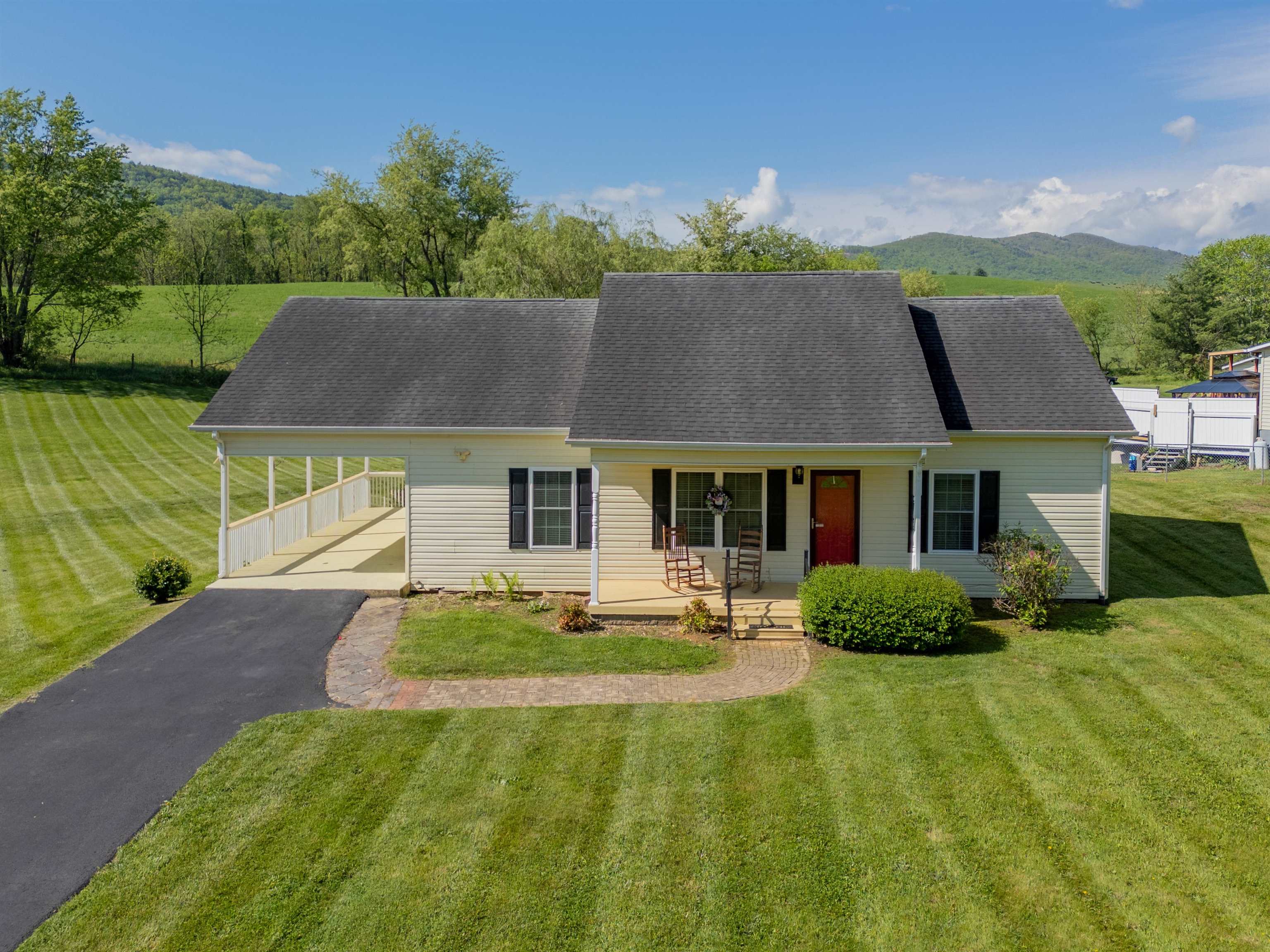 This beautifully maintained home sits on a level 0.86 acre lot and offers endless possibilities from gardening, recreation and entertainment. Step inside to find a spacious eat-in kitchen complete with stainless steel appliances. 3 bedrooms and 2 bathrooms with stunning hardwood floors throughout and a bright, welcoming layout. Enjoy peace of mind with a whole-house Generac Generator and the convenience of an outbuilding for extra storage. Located just minutes from Wytheville and Fort Chiswell and both I-81 and I-77. This home combines country charm with easy access to major routes. It's a must see!
