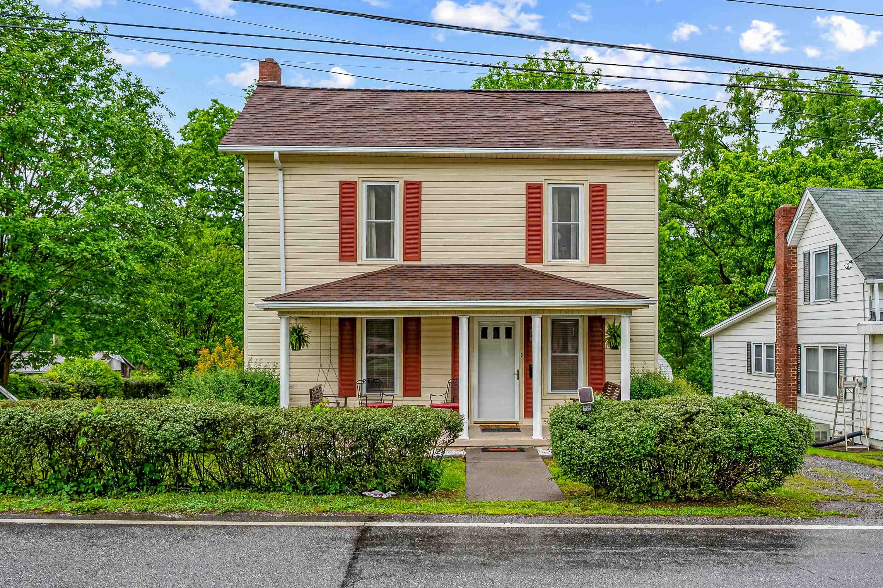 Looking for space and a great location? Welcome to 613 Main Street in the heart of Narrows, VA! This charming 4-bedroom, 2-bath home offers not just one, but two lots—with a flat, buildable extra lot right next door perfect for gardening, a play space, or future expansion. Step inside to find gorgeous hardwood floors in the living room, plush new carpet in the main level bedroom, and a recently updated bathroom on the main level. Relax on the peaceful front porch, or take advantage of the versatile bonus building out back—ideal for storage, a workshop, or even a garage. Nestled in a quiet neighborhood just minutes from local shops, restaurants, parks, and schools, this home delivers that perfect blend of small-town charm and everyday convenience. Clean, cozy, and truly move-in ready—this one checks all the boxes!