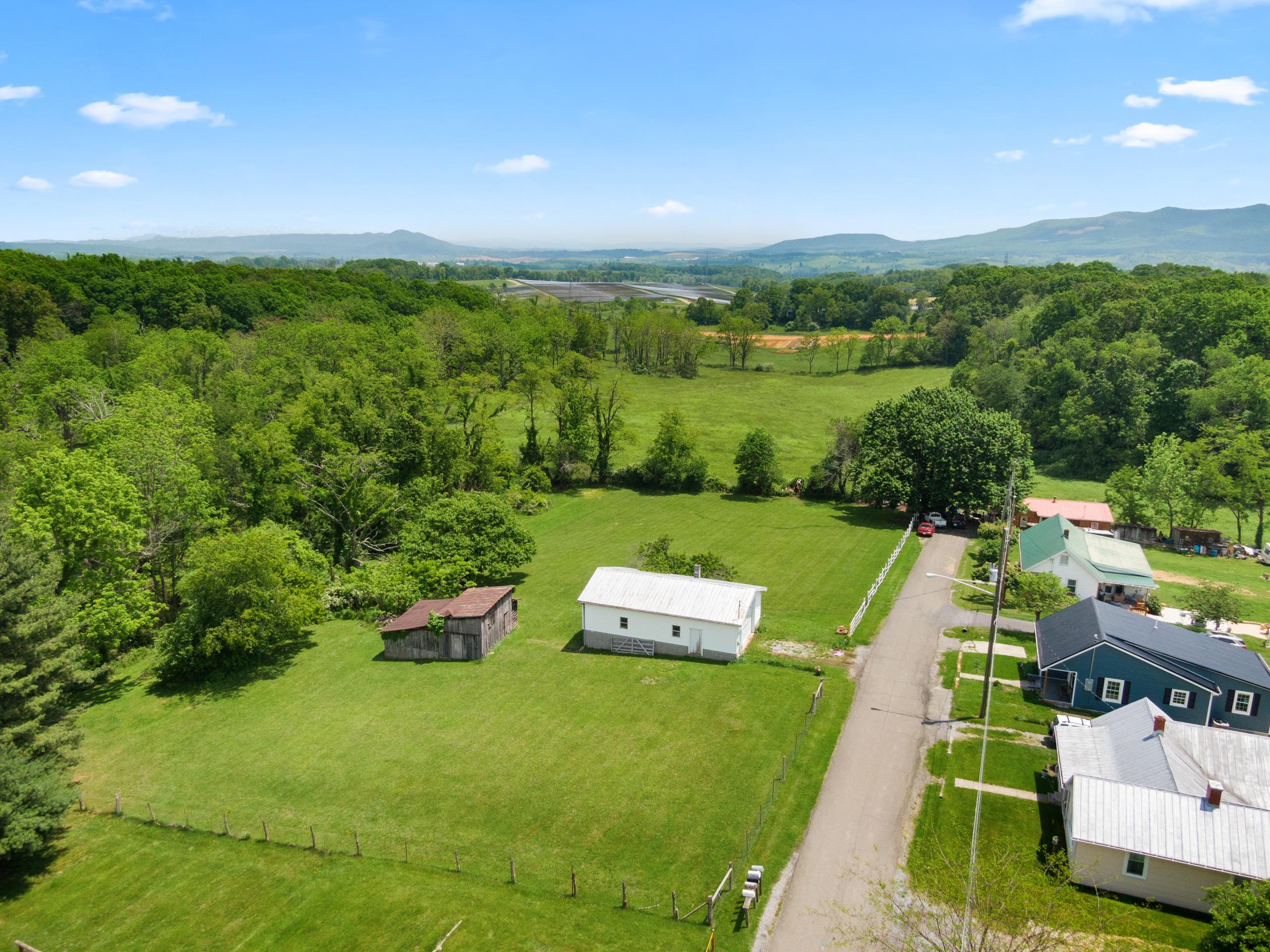 Discover the potential of this versatile 1.5-acre lot located on TBD Country Lane in Wytheville, VA. This clear, level parcel offers a peaceful country setting while being just minutes from downtown Wytheville and convenient interstate access. Zoned R3, the property presents multiple opportunities—it can be subdivided into additional lots or serve as the perfect location for your dream home. A garage structure already on-site offers even more value and could be converted into a single-family residence. Whether you're looking to build, invest, or develop, this unique property combines flexibility, location, and scenic surroundings.