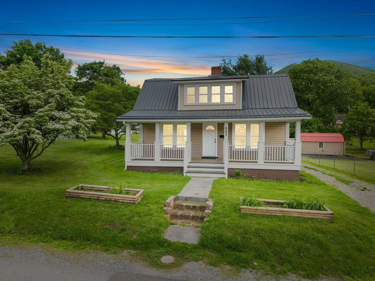 Don't miss this beautifully updated home situated on a spacious, level lot conveniently located near all amenities! This charming property features numerous updates throughout, including a large outbuilding and thoughtful handicap-accessible features for enhanced ease and comfort. The main level offers a bright & airy layout, including the master bedroom & laundry room for added convenience. The kitchen boasts generous space for cooking and gathering, while hardwood floors flow throughout the main living areas. Upstairs, you'll find two generously sized bedrooms, each with ample closet space, including walk-in closets, and a full bathroom. The home is move-in ready and has everything you need - truly a must see!
