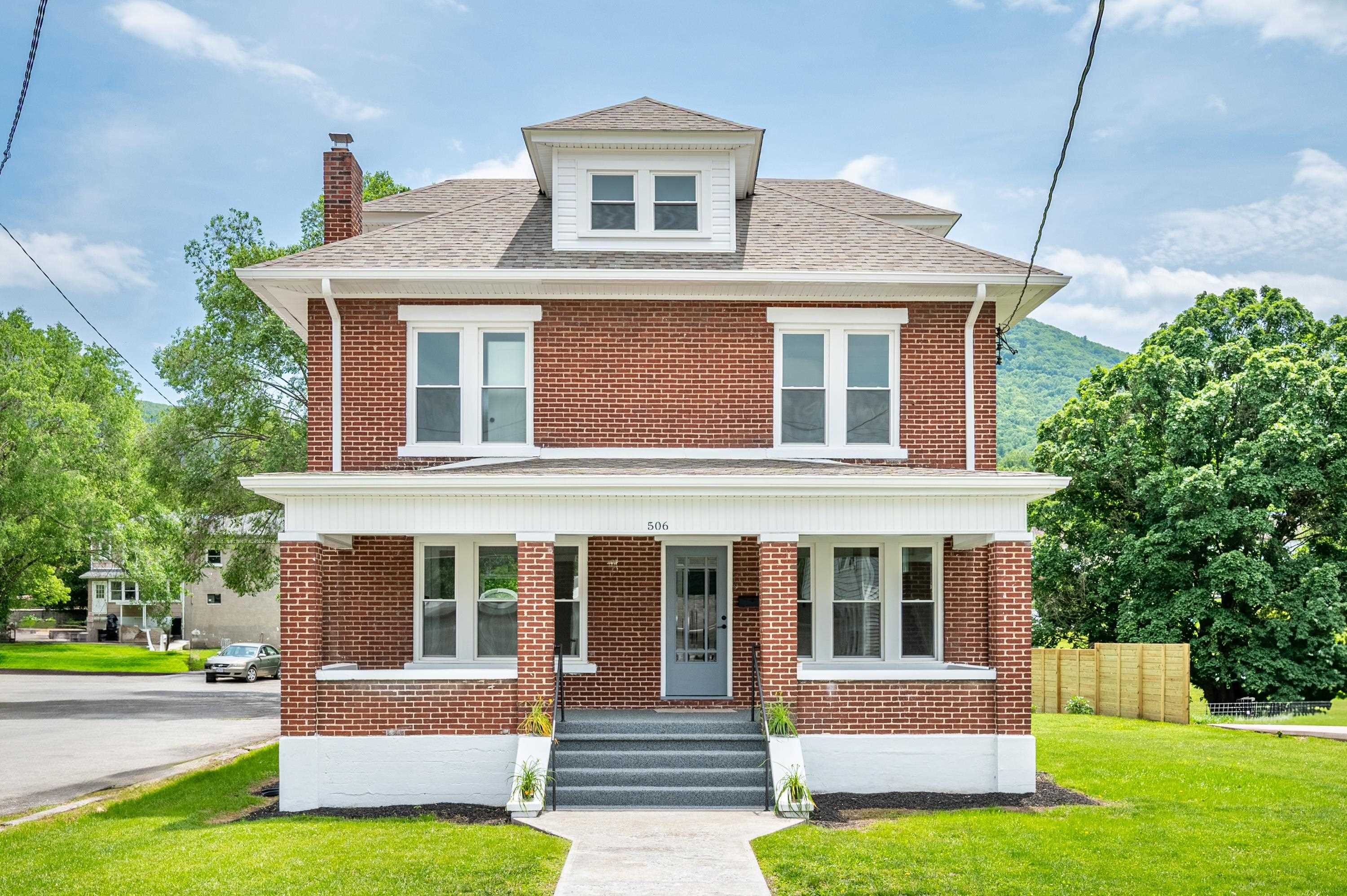 This stunning 3-story brick home, originally built in 1930, has been completely reimagined for modern day living. Featuring original hardwoods, new LVP and carpet, all-new kitchen and baths, updated plumbing, electrical, HVAC, and more. With a spacious new layout, a luxurious master suite, finished attic bonus room, and high-end finishes throughout, this home blends timeless charm with today's comforts. A true resurrection!