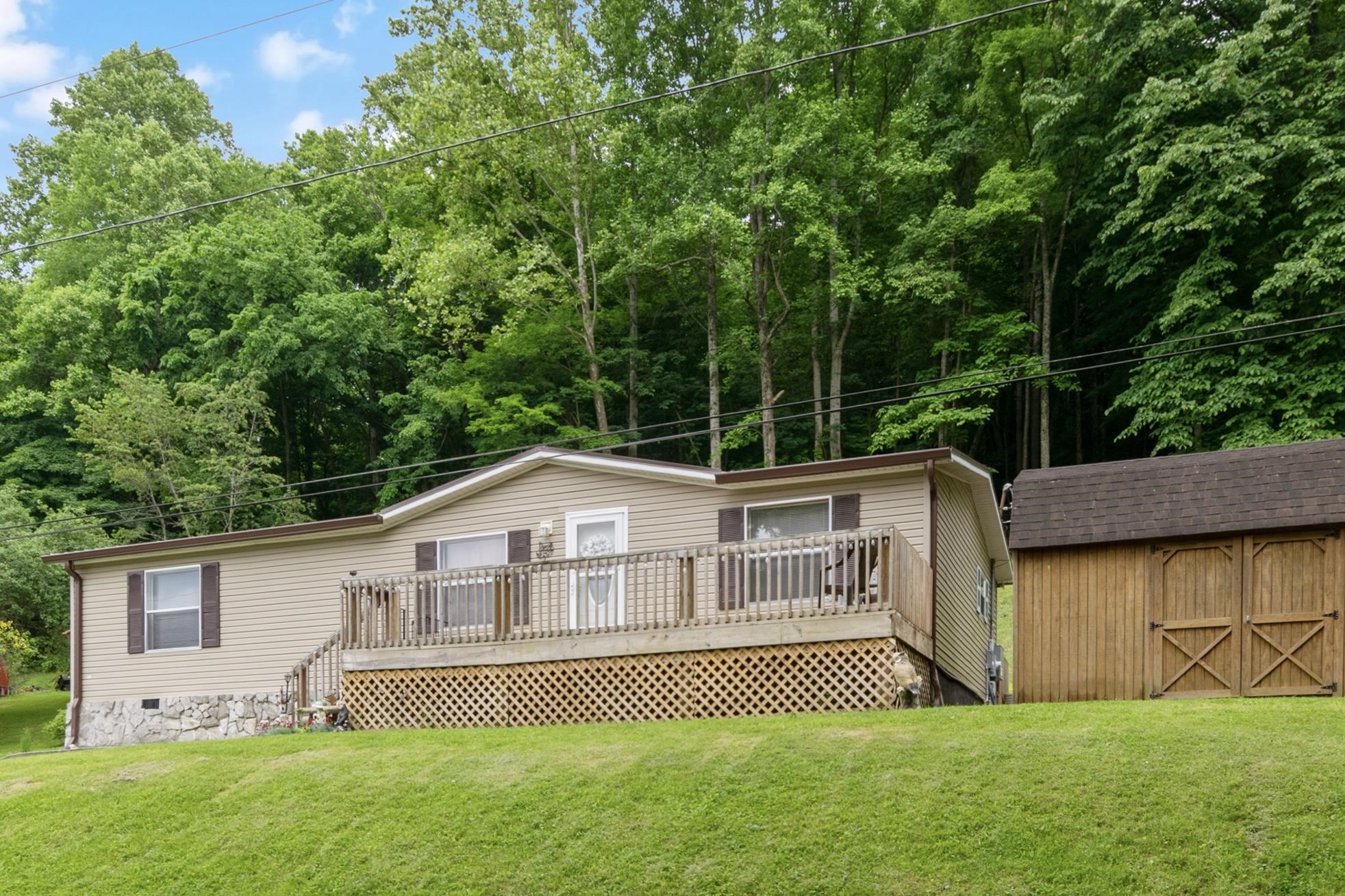 Discover the perfect blend of charm and comfort in this 3-bedroom, 2-bath home. This home offers the perfect blend of comfort, convenience, and privacy. Thoughtfully updated bathrooms add a touch of modern, while hardwood flooring and wood accents in the main living areas exude warmth and charm. Outside shed offers generous storage. Come see it today!