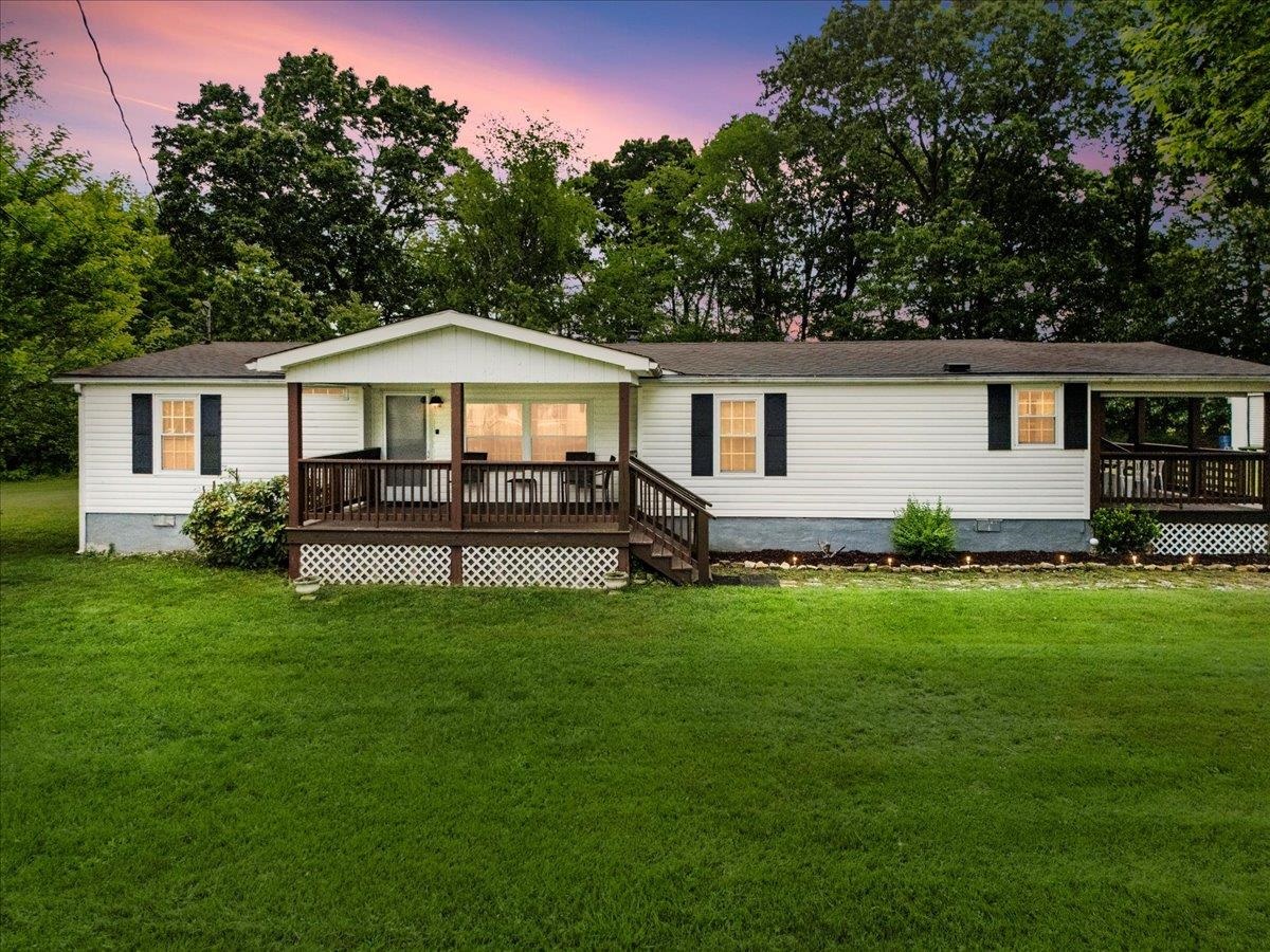 Welcome to 5488 Dublin Dr — where majestic trees, a flat yard, and birdsong create the perfect backdrop for your next home.  Step onto the large covered front porch and enter a warm, inviting space. Inside, you’re greeted by a mudroom and laundry area that leads into a spacious, eat-in kitchen.  A proper dining room is attached to allow for more flexibility and space.   The open-concept living area offers plenty of room for relaxing or entertaining, with a layout that flows effortlessly throughout the home. Featuring three bedrooms and two full bathrooms, including a true primary suite, this home balances privacy and comfort beautifully.  Outside, enjoy the convenience of a double carport and a storage shed for all your tools and gear. The flat backyard extends into a serene wooded area — the perfect place to unwind, listen to the birds, and soak in nature.  Don’t miss your chance to make this charming retreat your own. Schedule your private tour today!