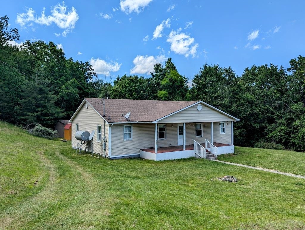 Check out these 2 homes in Independence, VA set on +/-20.68 acres of wooded land! This property is ideal for recreational use, investment potential and those seeking a peaceful retreat. Also visible from the property is the Buffalo Mountain. This sale includes 2 parcels of land being sold as one. 291 Beulah Ln: A single-level home featuring vinyl siding, a shingle roof, oil heat, and window AC. Home has 3 beds, 1.5 baths, and has approx. +/- 1,887 sq ft of living space. 337 Beulah Ln: A single level home featuring 2 beds, 1 bath and +/- 1,092 sq ft of living space. Beulah Ln is a private non-state maintained shared roadway.