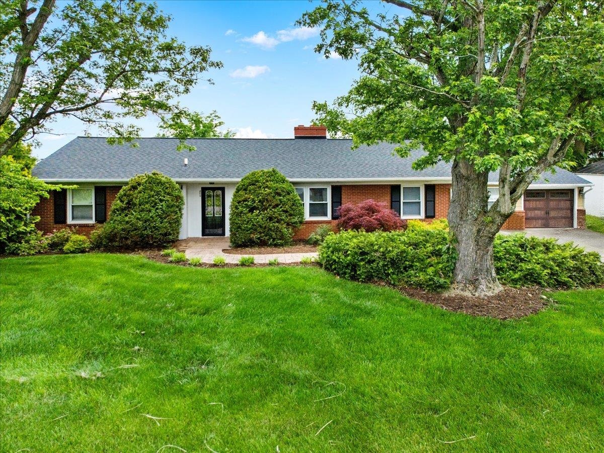 Come see this spacious brick ranch in the heart of Radford! With 4 bedrooms, 2.5 bathrooms, and nearly 3,700 finished sqft—including a full basement—you’ll have room for everyone and everything. The main level offers hardwood floors, abundant natural light, and a well-appointed kitchen, while the lower level adds flexible living space and a stunning tile bathroom with a soaking tub. Enjoy the attached garage, additional storage shed, and 0.36-acre lot with beautiful landscaping. Schedule your showing today and picture yourself at home here!