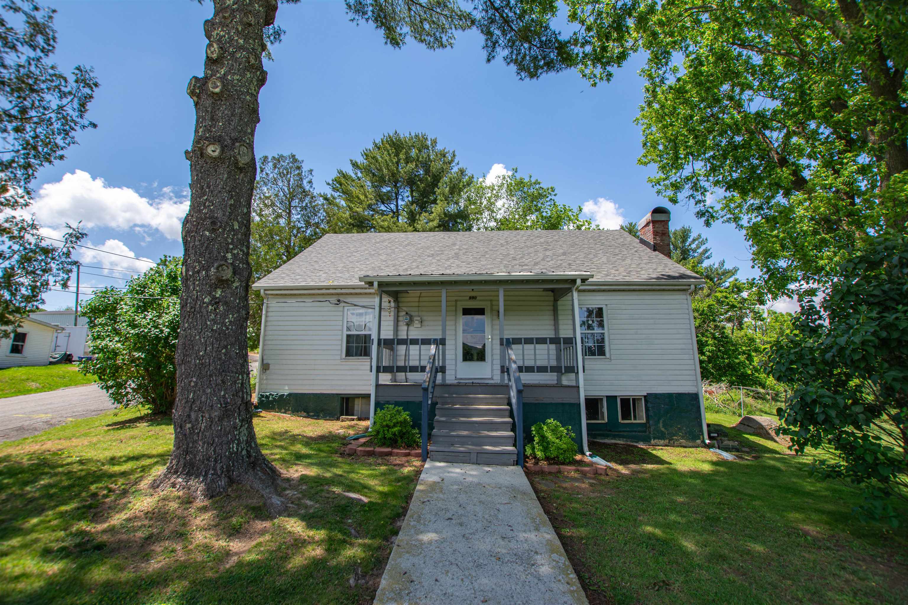Don’t miss out on this rare corner lot in the heart of Wytheville. Whether you envision a lovingly restored bungalow or a brand-new condo project, 990 W Jefferson St delivers location, size, and character. Whether you’re a homeowner eager to restore vintage character or an investor looking to capitalize on a prime development site, this property delivers unmatched potential. Nestled just minutes from downtown, the house itself is a classic fixer-upper—offering original hardwood floors, a welcoming covered front porch, and charming period details waiting to be revived. Alternatively, clear the existing structure and unlock the oversized lot’s full promise: build a multi-unit condominium complex in a high-demand location. Multi-unit builds fetch over $1.2M -$1.4M upon completion. Seize the gap between acquisition cost and market value. Act quickly—properties with this level of potential don’t stay on the market long! Property being sold AS-IS.
