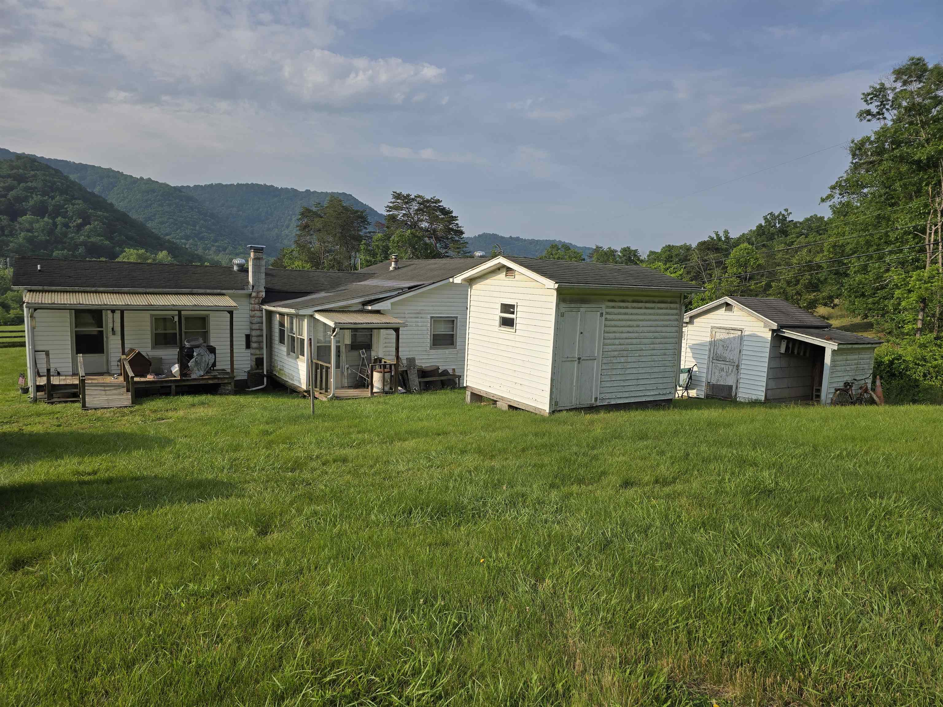 Nestled in the tranquil countryside of Elliston, Virginia, 2093 Burkette Rd offers a unique opportunity for those seeking a blend of rural charm and access to the conveniences of daily life. This 2.15-acre property features a 1975-built home with 2 bedrooms and 1 bathroom, offering over 1,000 sq ft of living space. This makes it an ideal canvas for renovation or expansion. The expansive lot provides ample space for gardening, outdoor activities, or the construction of additional structures. Located just minutes from I-81, this property offers easy access to the Roanoke and Blacksburg areas—combining peaceful living with proximity to urban amenities.