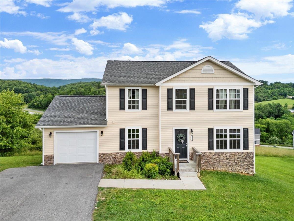 Come see this beautiful home in The Cedars—just 15 minutes from downtown Blacksburg! Featuring 4 spacious bedrooms, 2 full baths, and 2 half baths, this contemporary layout offers stunning 360° views of the Blue Ridge Mountains. Inside, you'll find hardwood floors, a bright open kitchen, and tons of natural light. With public utilities, lightning-fast internet, and lawn care included through the HOA, living here is as easy as it is scenic. Enjoy 22 acres of community space with picnic shelters, a basketball court, playground, walking trails, a pond, and more. Schedule your showing today!
