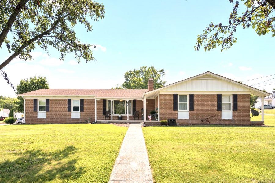 Beautiful, Updated Brick Ranch on level, corner lot. Great location near golf course, park & pool! Lovely hardwood floors. Spacious Living RM w/fireplace/gas logs. Formal Dining RM w/pocket doors. Huge Double Garage w/concrete drive. Lots of updates! New Heat Pump in 2023! Updated electrical box & meter. Updated appliances, plumbing & more!