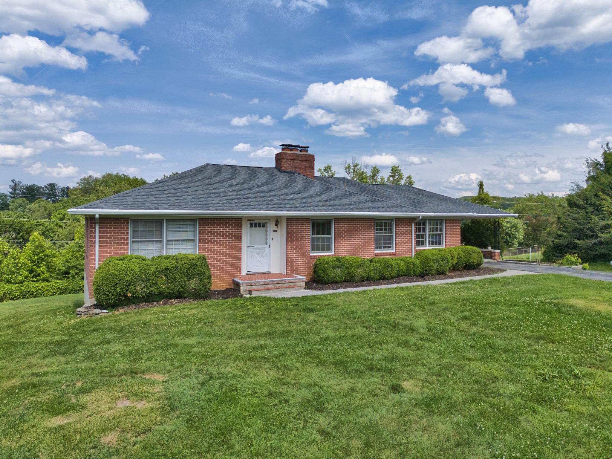 Charming brick ranch a stone's throw from downtown Christiansburg, I-81 and only 15 minutes to Blacksburg and Virginia Tech situated on a large lot. There is an abundance of room to entertain with a large, formal living room, very spacious kitchen, family room with gas logs in a woodburning fireplace and built-in bookshelves and a full walkout basement that is partially finished & a built in carport that also can be used for entertaining.  There are 3 large bedrooms with plenty of natural light and the full bath has a spacious vanity with an additional half bath and room for a second full bath too. A stackable W/D is on the main level and additional washer dryer hookup and sink in the basement along with a tremendous amount of storage and single garage for all of your yard equipment. This beautiful home is situated on a mostly level lot in a well established neighborhood.  Call for a private showing today!