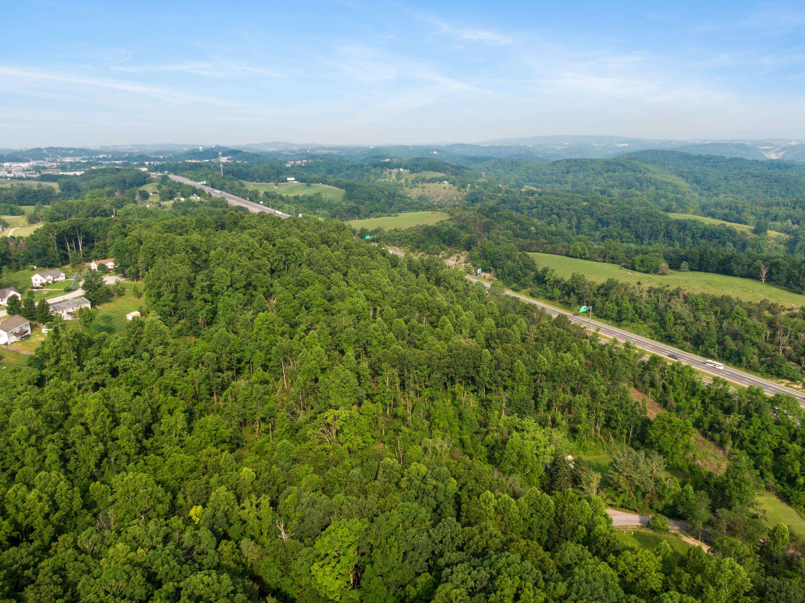 12.5 acres in the Town of Christiansburg, zoned Agricultural! This wooded parcel offers mature timbers, multiple build sites, and privacy—perfect for a homestead, farm, or dream home. Subdivision potential adds investment appeal. Electrical and septic are already installed, with public water available at the street. Conveniently located near I-81 and Exit 118 for easy access to town amenities.