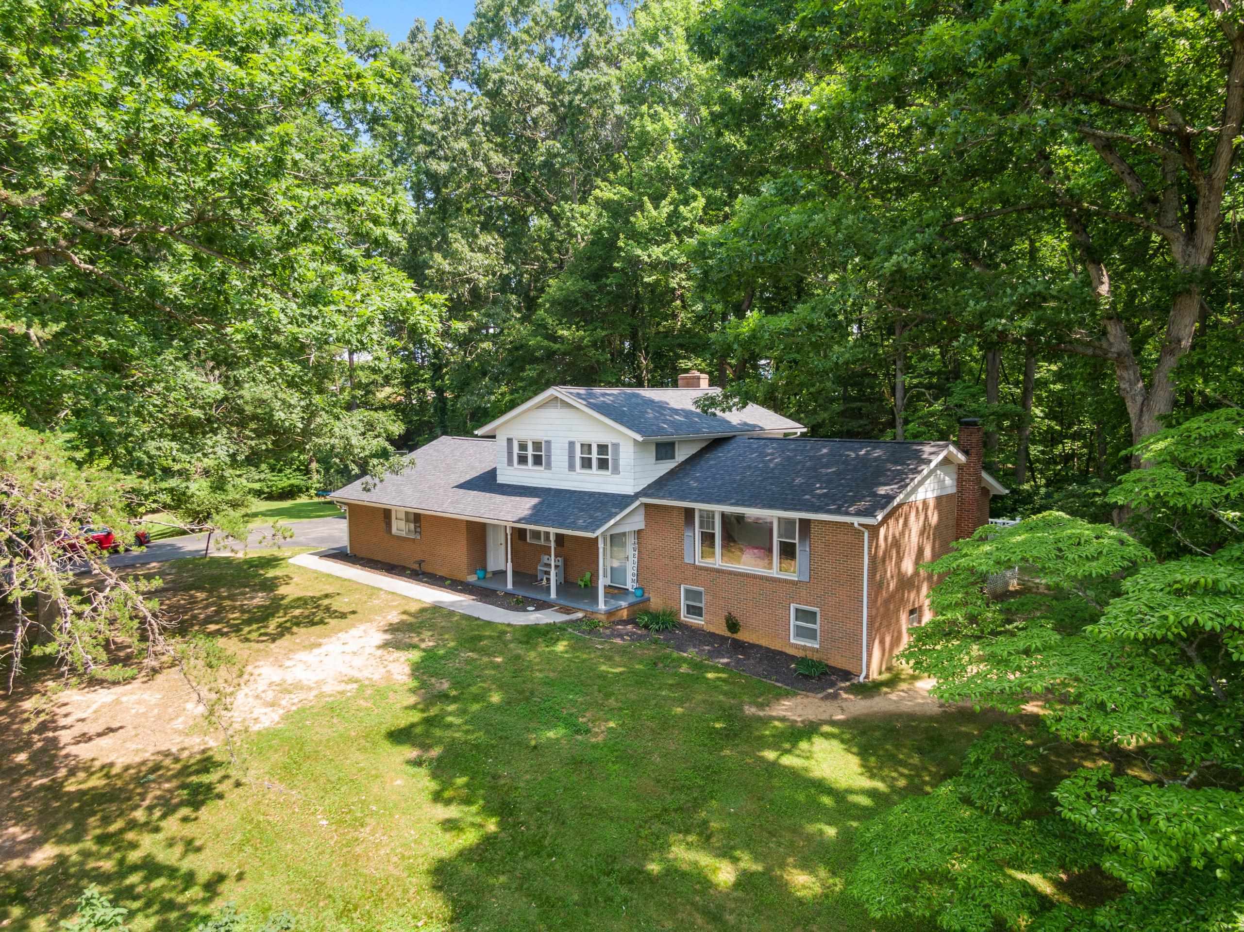 Welcome to your new home! This 1 1/2 story home offers 2,190 sq. ft. of comfortable living space - 3 BR and 3 BA - set on a serene 1.79-acre lot with a flat, usable yard - perfect for entertaining, gardening, or simply enjoying the peaceful surroundings. Step inside to find a completely renovated kitchen with modern finishes and a completely renovated upstairs bathroom that blends comfort and style. Additional upgrades since 2018 include a new roof, new heat pump, and two new garage doors. Outside you'll find a private backyard, a handy storage shed, a nice relaxing deck, and plenty of open space for play or projects. This home combines thoughtful renovations with privacy and space, ideal for families seeking a nice home/retreat!! Don't miss this opportunity - schedule your showing today!!