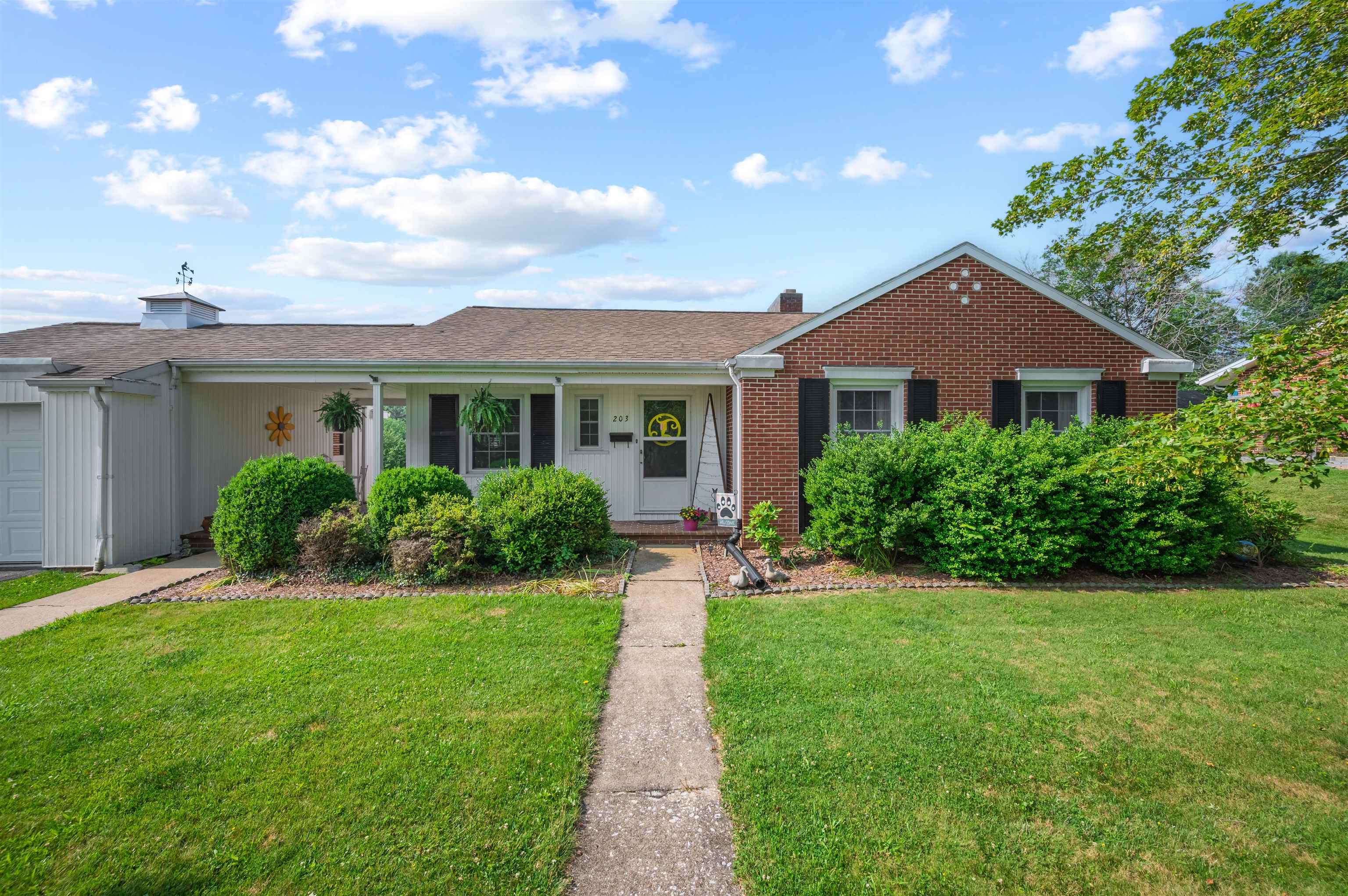 Welcome home! A well-built brick ranch on a quiet street in Galax city limits. This 3-bedroom, 1.5-bath home offers the ease of one-level living in a thoughtfully designed layout. Enjoy the character and quality paired with modern updates including a new heat pump, updated windows, plumbing, and more. A full basement with half that is nearly finished adds potential for even more space. The attached single-car garage connects to the home through a beautiful breezeway, perfect for enjoying your morning coffee or an evening breeze. Step outside to find a 13x12 partially finished outbuilding that’s ideal for a private office, guest suite, or hobby space. Situated in a prime location just minutes from all the conveniences and charm that Galax has to offer shopping, dining, schools, and parks this property combines comfort, function, and convenience. Don’t miss your opportunity to own this lovely, move-in-ready home in the heart of Galax!