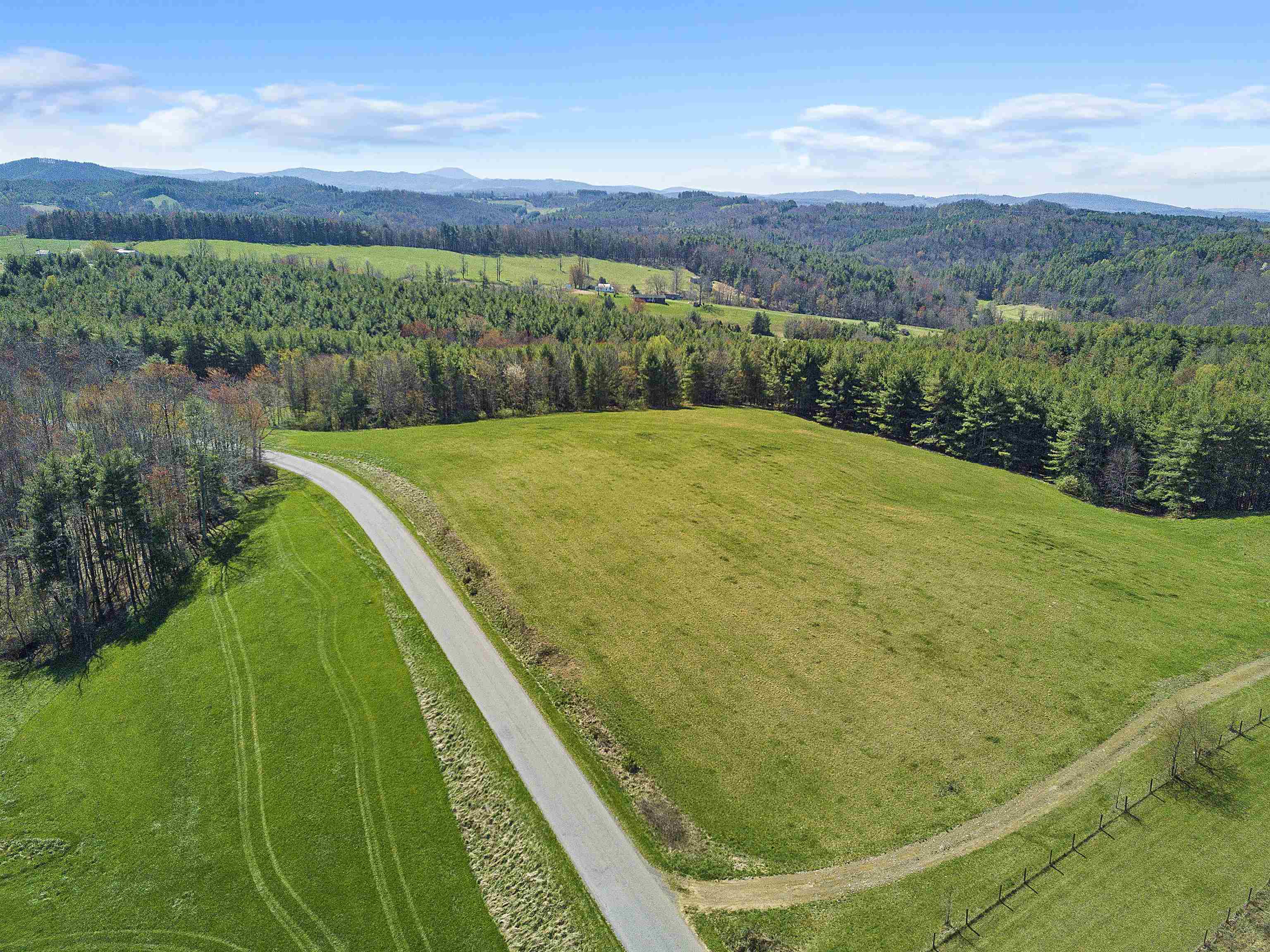 Great small farm located in Floyd County VA! 5 acres have been being used as a hayfield, and about 8 acres are wooded. Great building site on the property, with a state-maintained road with very little traffic. Perfect for a small homestead! Enjoy this wonderful property in a peaceful country setting that is convenient to Radford, Christiansburg, Hillsville, and Blacksburg. Fiber internet up to a Gig speed is available. (Property is owner/broker).  Boundary lines shown are approximate and purchaser to verify any information.