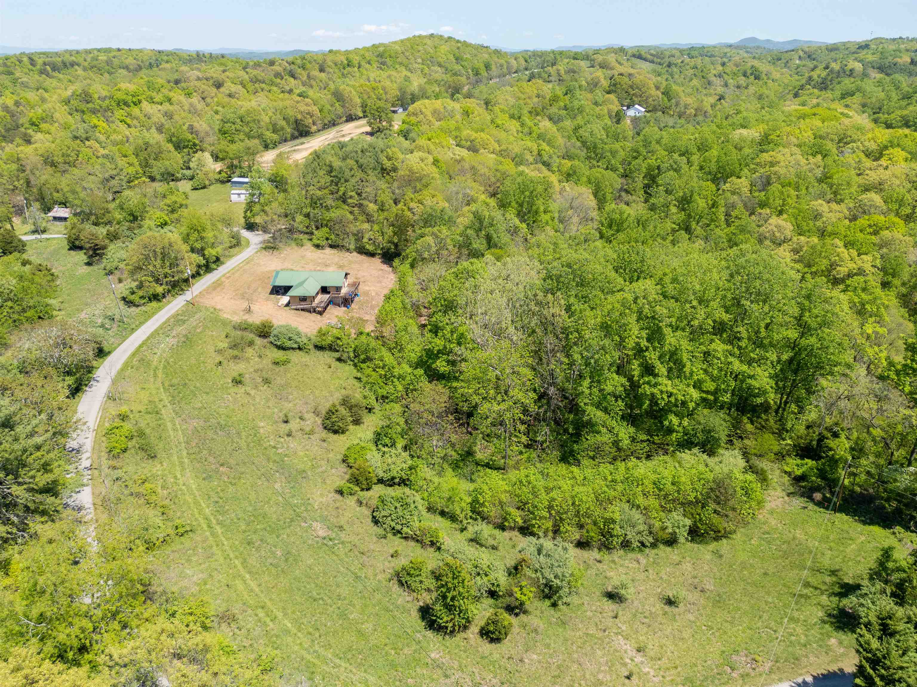 Lot #3. This +/- 2.0292 acre property features a gentle slope. The tract has frontage on Cabin Land Drive and can be accessed by the easement road. The eastern side of the tract is mostly wooded. Property would be ideal for building your dream home on Claytor Lake! The lots adjoin, so you can purchase one or multiple lots to get your desired acreage! Enjoy lake access through the +/- 0.66 acre Common Area which serves this offering along with Offering #1 and Offering #2. The drainfield information for Offering #3 is as follows: Three bedroom gravity primary with Puraflo drip reserve. Engineering design required for reserve.