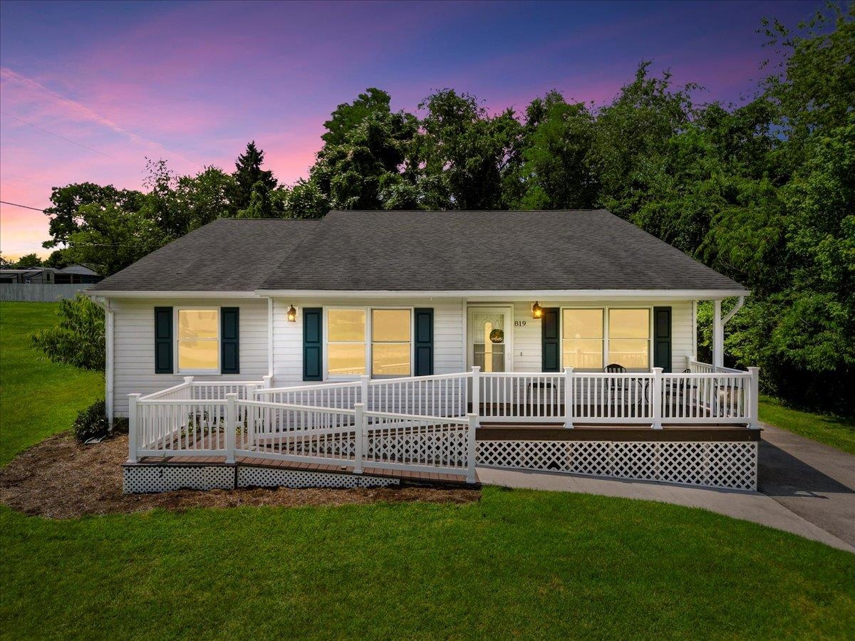 Beautifully Updated & Handicap Accessible Ranch in the City of Radford! Don’t miss this home offering comfort, convenience, and accessibility- all on one level with 2205 sq ft. Featuring 4 bedrooms and 2 full baths, this home boasts an open floor plan with hardwood flooring throughout, cheerful cabinetry in the kitchen, and a bright dining area perfect for gathering. A handicap-accessible addition was completed in 2014–2015, including a large primary suite with oversized closet & roll-in/walk-in tub for added ease and safety. Access into the home is made simple with a Trex handicap ramp entry. Enjoy extra living space in the sunny four-season sunroom, relax on the covered front porch, or unwind on the rear deck. Additional features include two heat pumps, a paved driveway, and a storage building for your tools or hobbies. This home combines modern updates, functional living, and accessibility with easy access to I81 & all points in the New River Valley!