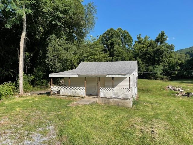 Charming Cottage on .4 Acre Lot - This 480 sq. ft. one-bedroom, one-bath home offers a unique opportunity for investors or DIY enthusiasts. Featuring a family room, living room, and kitchen, this compact home has great potential with the right vision. Sitting on a spacious 0.4 acre lot and conveniently located near modern amenities and conveniences. Sold AS-IS - bring your ideas and make it your own!