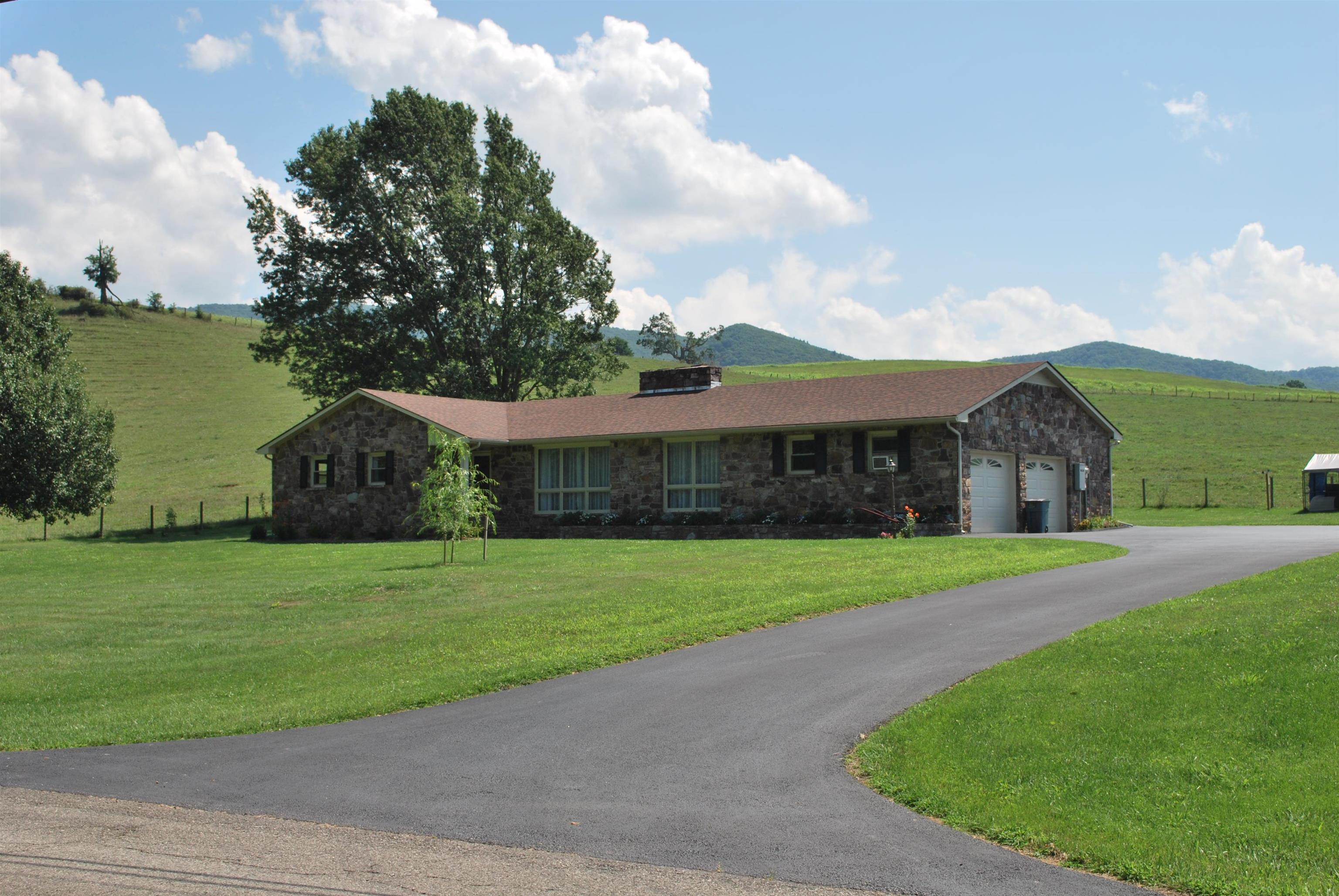 This beautiful 4 bedroom, 2 bath brick ranch is set in a serene country setting but will meet the needs of those wanting privacy, yet still just be a short drive to town. Located close to national forest for the outdoorsman/woman. Iron Mountain, Virginia Highlands, Hungry Horse East and Collins Cove horse camps are just a short drive away. Whole house Generac generator, 2 car garage and gas hookup for a grill on the back patio, gas ventless fireplaces in den and formal living room with convection vents for heat distribution. Fruit trees planted on property includ, plum, peach, bing cherry, yellow cherry, paw paw trees, blackberry and raspberry bushes and concord and muscadine grapes. House is listed below current appraisal.