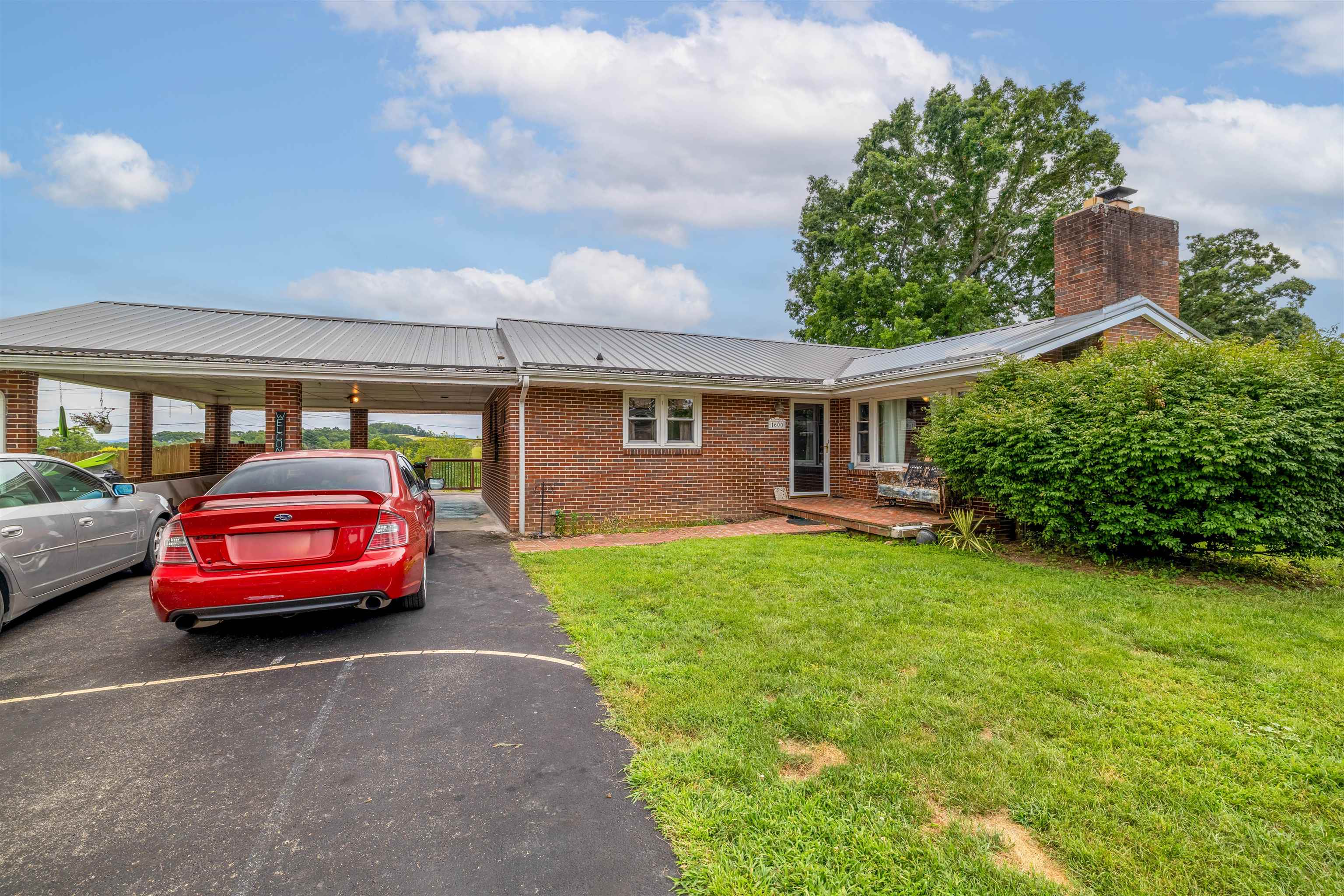 Tucked away at the end of a quiet double cul-de-sac, this 3 bedroom, 2 bathroom brick ranch offers quiet living and a peaceful atmosphere. Enjoy the ease of one level living with the bonus of a full sized basement for extra space and storage. The home features a newer metal roof, a spacious double carport, and a storage building out back. Whether you're relaxing on the deck or making use of the flexible basement space, this home combines comfort, functionality, and a hard-to-beat location. If you're looking for a solid home with privacy, functionality, and potential, this one is a must see!