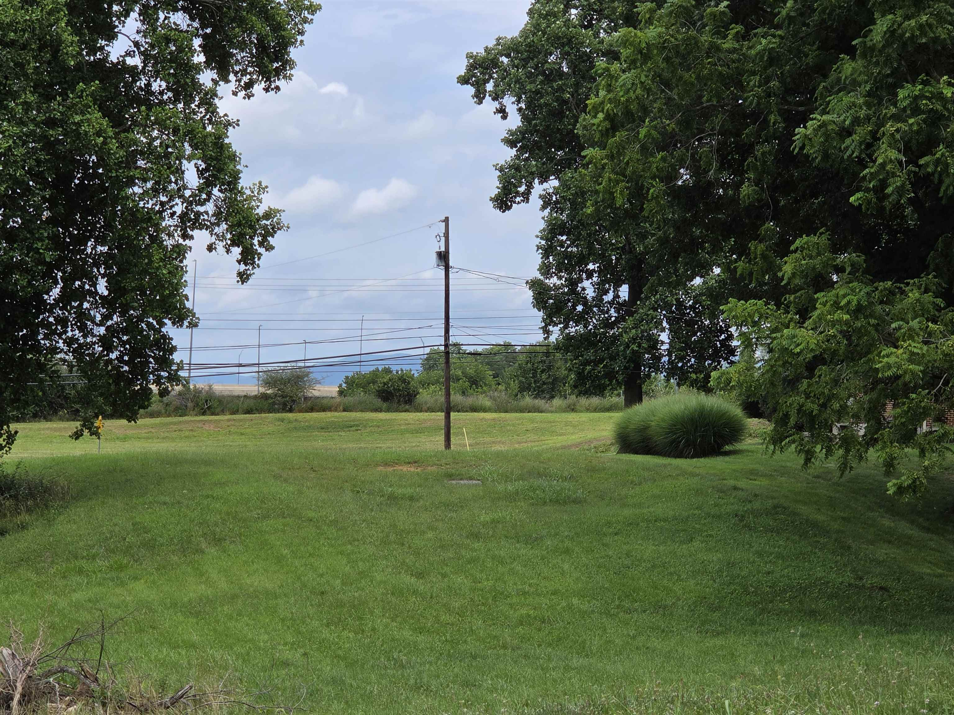 Zoned I2, Industrial General, this lot is conveniently located between Christiansburg and Blacksburg right off of N. Franklin St/Rt 460.  Road frontage on Boxwood Dr and Palmer Drive.  Public utilities, including natural gas, available at the site.  No known easements or encroachments incumber the property.  Details for zoning allowable uses in documents.  Very gentle rolling topography on the site will make development very easy.  Great visibility to Route 460 traffic.  Residential uses possible with Special Use Permit.