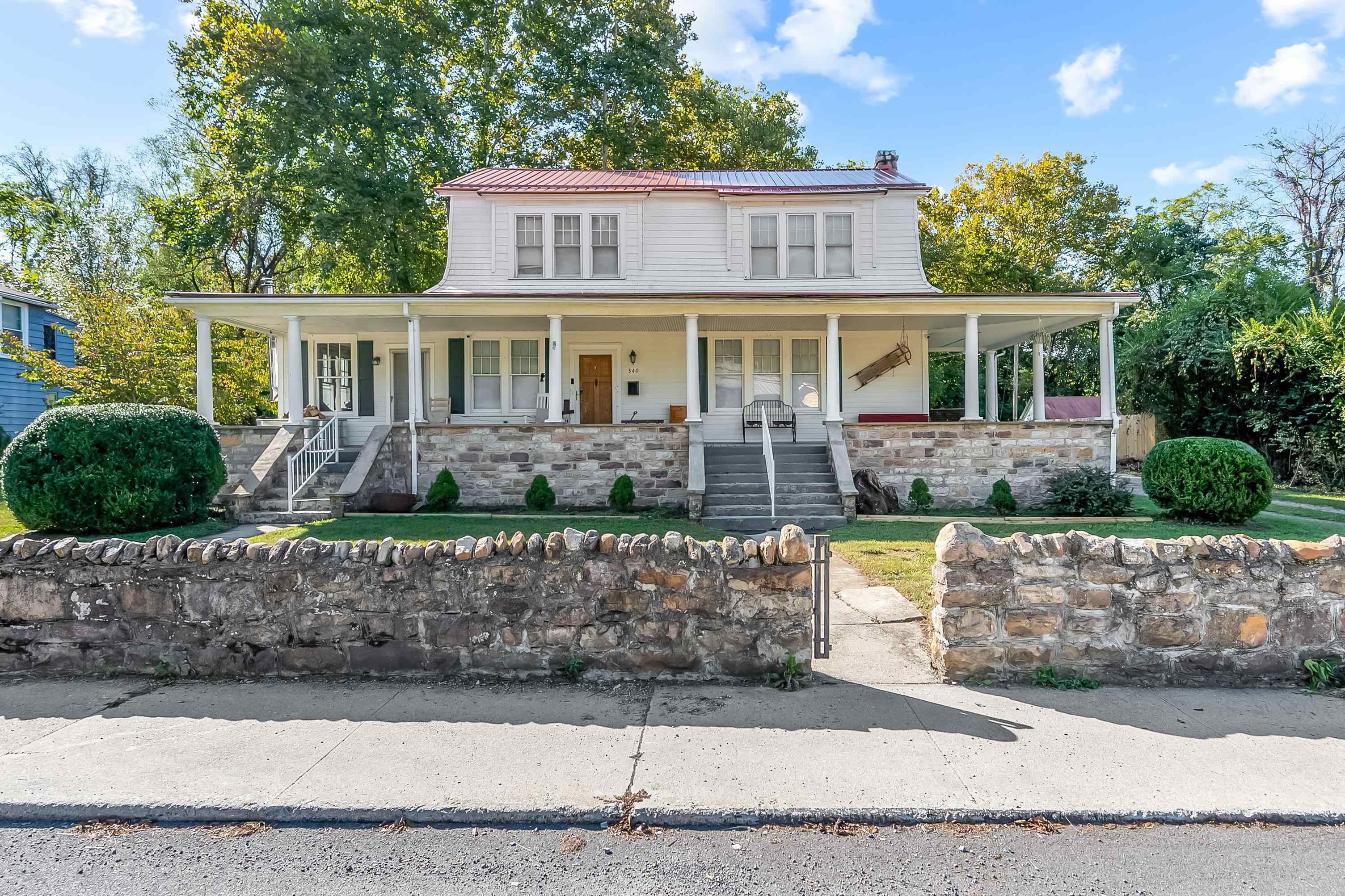 Welcome to a truly exceptional home where historic 1918 character has been meticulously preserved & seamlessly blended w/ modern updates. This is more than just a house; it's a piece of Narrows history, ready for its next chapter. Boasting a generous 2,664SF w/ 3BRs & 2.5 baths, this residence offers abundant space & comfort. Step inside & be greeted by many charming details including 9ft ceilings, crown moldings, stained glass accents & cedar-lined closets that speak to the home's rich heritage. Outside, relax & entertain on the wrap-around porch, the perfect place to enjoy your morning coffee or greet neighbors. The partially finished basement is a versatile canvas, offering a full bathroom & limitless potential for a finished rec room, home gym, workshop, or simply clean, ample storage. Enjoy the spacious backyard w/ mature trees on .50 ac. Conveniently located & quiet, you'll enjoy easy access to local amenities while owning a home that truly stands out. Don't miss this rare value!