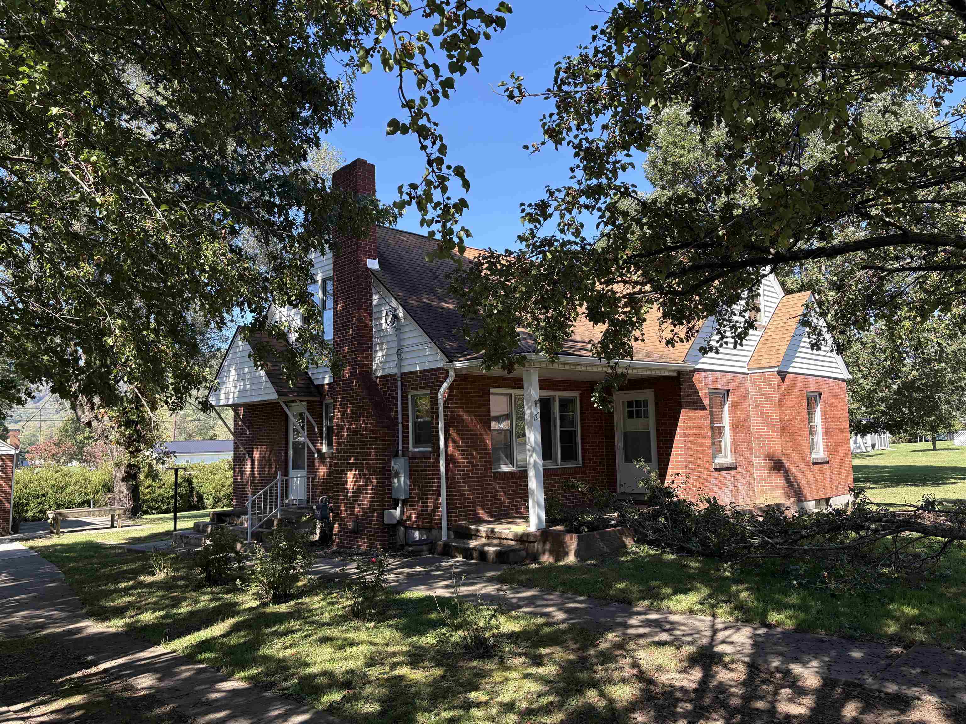 Welcome to this lovely 4BR, 2BA brick home in the desirable Colonial Heights. Hardwood Floors with Oak Bannister. New Stainless Steel Appliances with over-sized refrigerator. Two level lots with plenty of yard. Updated Baths with new Vanities and shower. This house is very close to Narrows High School and a short walk. Detached Two Car garage. Garage door motor untested. Both doors open by hand at this time.