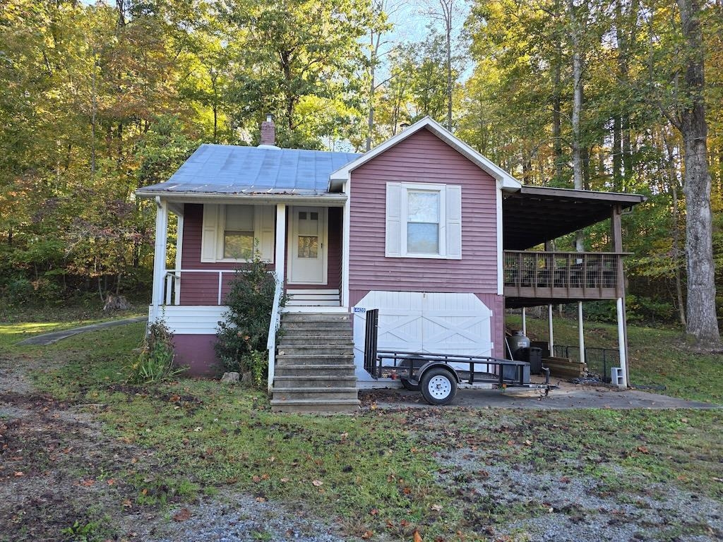 Auction Property: List price may not reflect final sales price. List price is starting bid on the property and is non-reflective of value. Auction Ends Nov. 19th at 4PM. Check out this cottage with 868 total finished sqft on the main level and 700 unfinished sqft in the basement. It has 2 beds, 1 baths and was built in 1925 with recent remodels. Home sits on +/- 1.72 acres. This property will be sold at real estate auction. The home has been updated and is in good condition. It features laminate hardwood flooring throughout, with laminate tile in the kitchen and bathroom. A heat pump was installed in 2022. The kitchen includes a refrigerator, range, and dishwasher. The home has covered front and back porches and a large, covered side deck. The property has a private well and septic system and a backyard with open space. Located between the Town of Stuart and the Woolwine community near the Blue Ridge Parkway, Philpott Lake, and Fairystone Park, this property is ready for you!