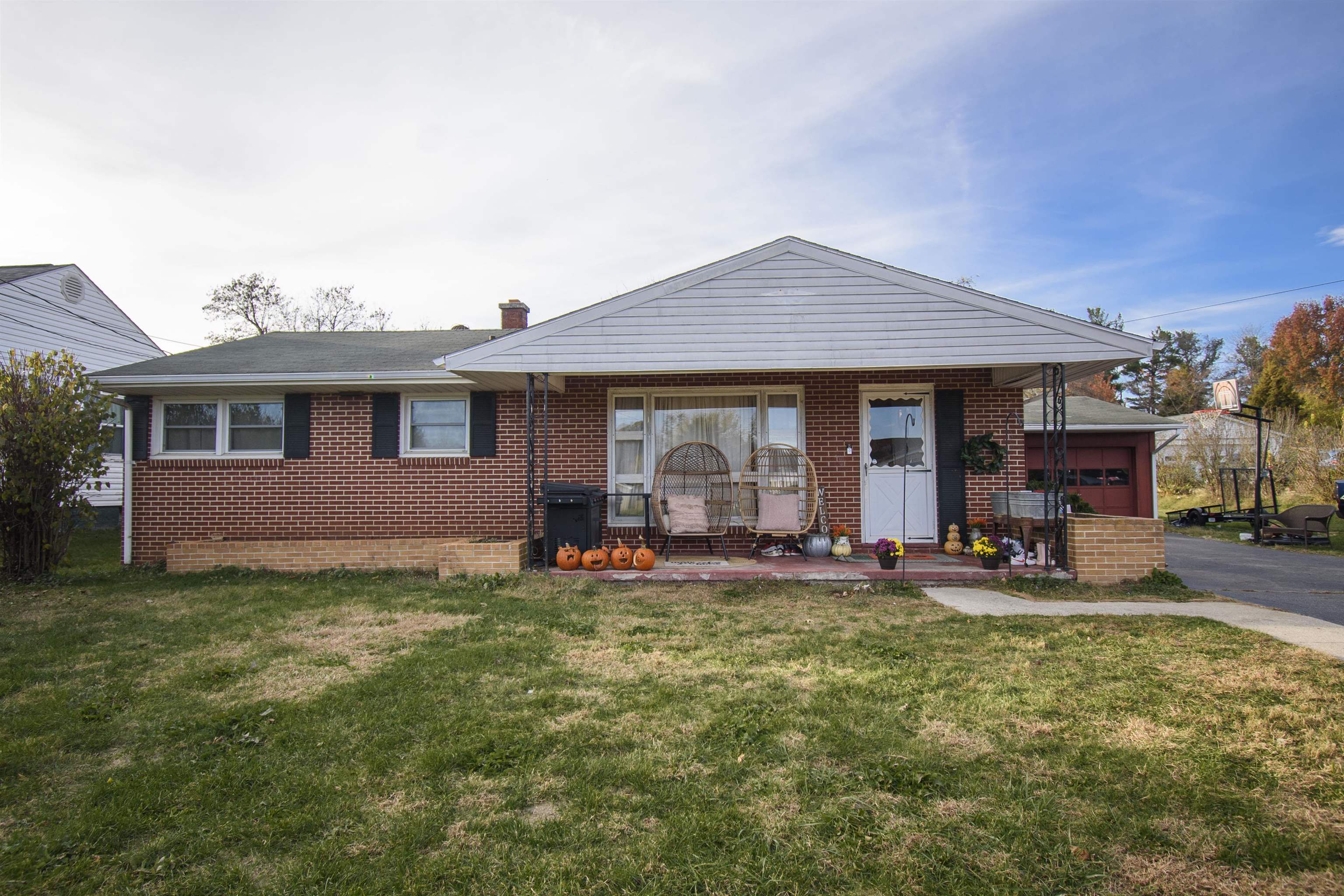 Welcome to 16 Alleghany St SE, Christiansburg — where comfort meets classic charm. Nestled on 1.1 acres, this beautifully maintained home offers the perfect balance of space, style, and serenity. Step inside to discover bright, open living areas designed for both everyday comfort and effortless entertaining. The thoughtfully arranged floor plan provides a warm, welcoming flow throughout each room. Outdoors, enjoy the expansive yard—ideal for gardening, play, or simply relaxing in your own private retreat. The spacious garage offers convenience and ample storage, completing the home’s blend of practicality and elegance. Perfectly located just minutes from downtown Christiansburg, parks, and schools, this exceptional property invites you to enjoy the best of small-town living with modern comfort and timeless appeal.