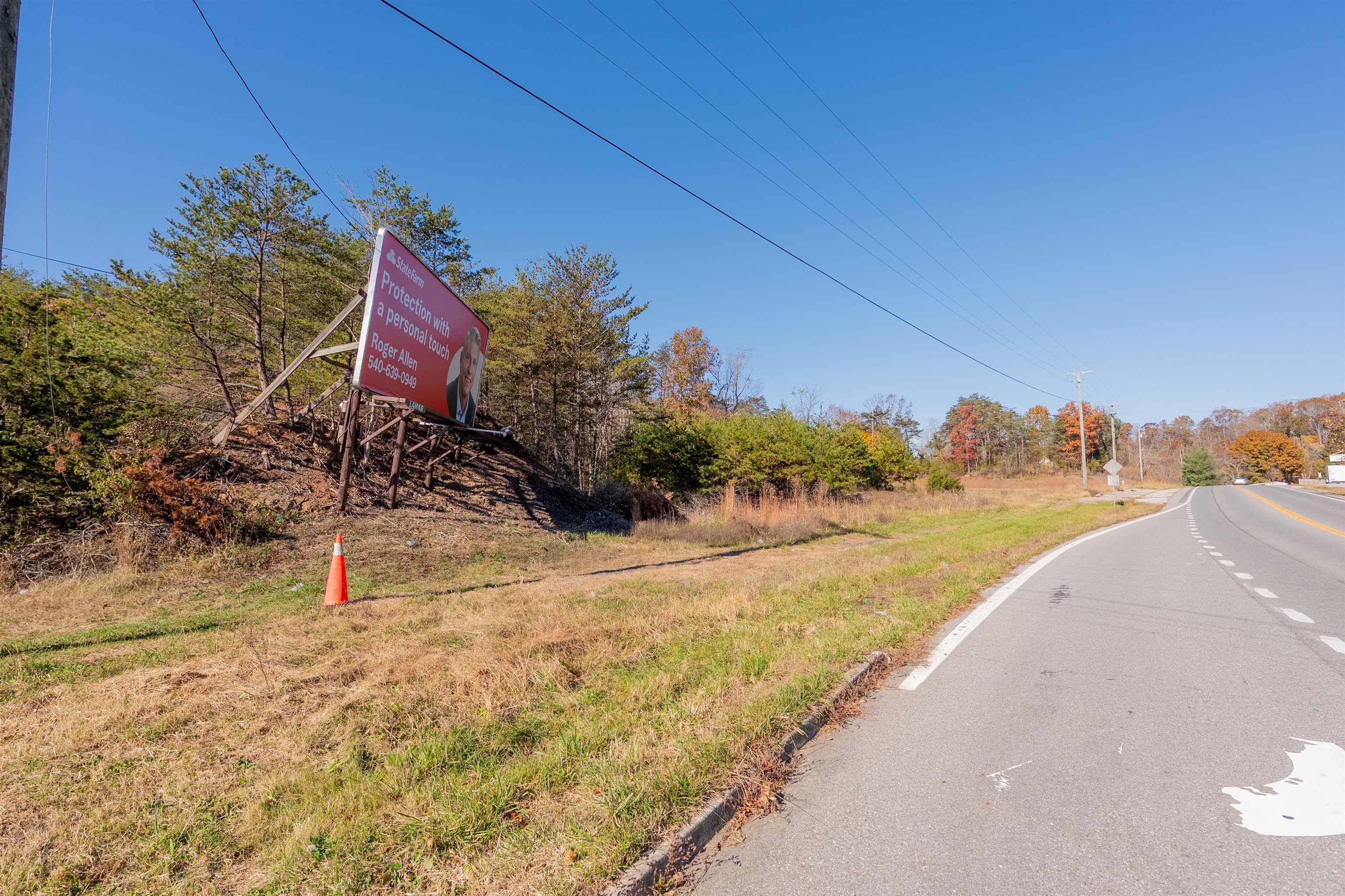 Welcome to a prime commercial opportunity at 3713 Radford Rd with public water, sewer and utilities available. This property offers a total of 2.37 acres zoned General Business, making it a highly desirable location for various commercial ventures. There's tons of potential with the extensive road frontage, and high visibility positioned near other established businesses. Explore the potential of the perfect location for your next project!