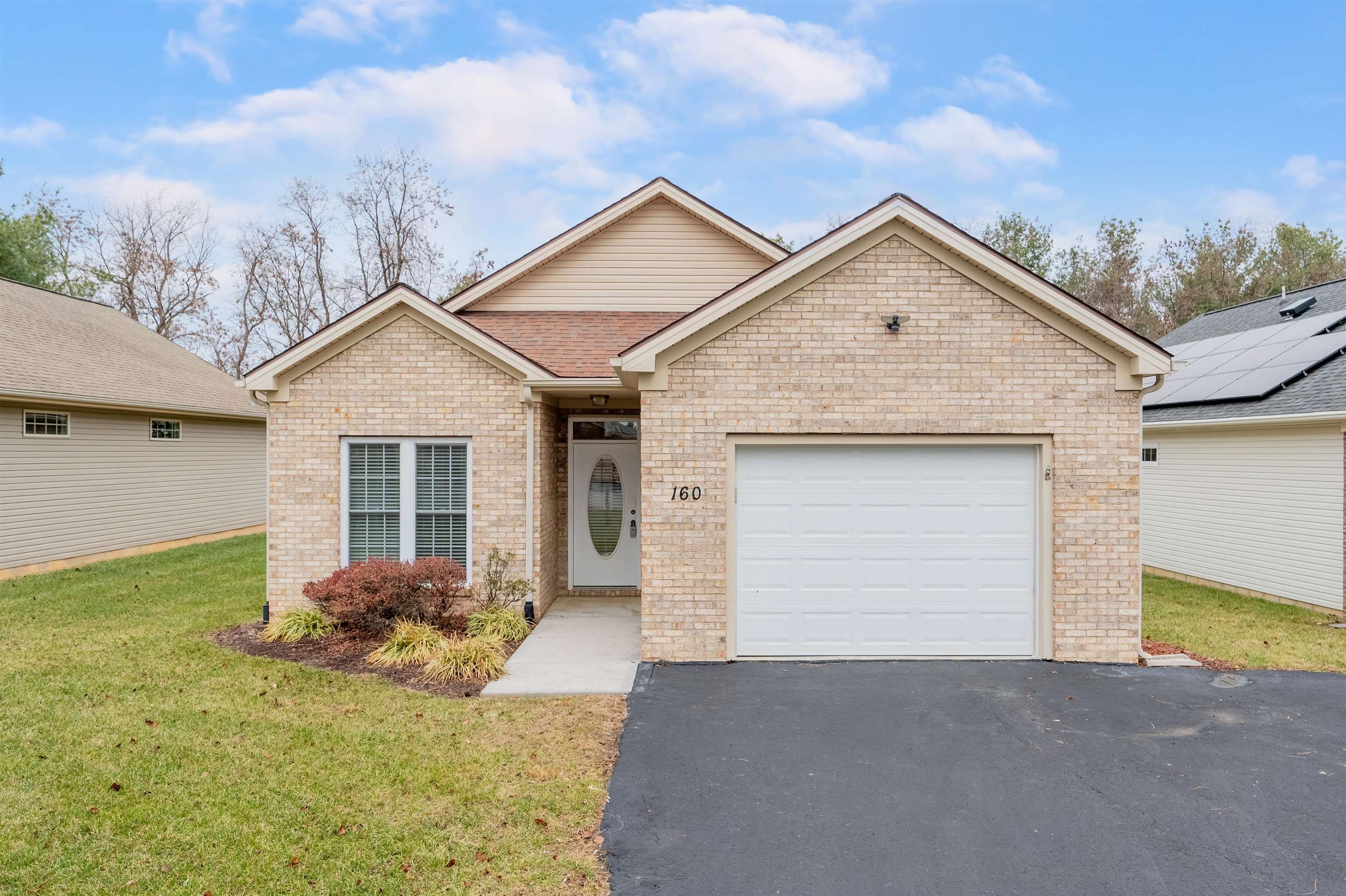 Enjoy easy, one-level living in the desirable Windsong Heights community. This inviting patio home features an open layout with eat-in kitchen, vaulted ceilings, a bright sun room, and a private patio just outside. The two-bedroom, two-bathroom design includes a spacious primary suite with an ensuite bathroom and walk-in closet, and the single-car garage offers convenient storage and parking.  With its low-maintenance lifestyle and great location, this Windsong Heights home is a wonderful opportunity for anyone seeking comfort and convenience.