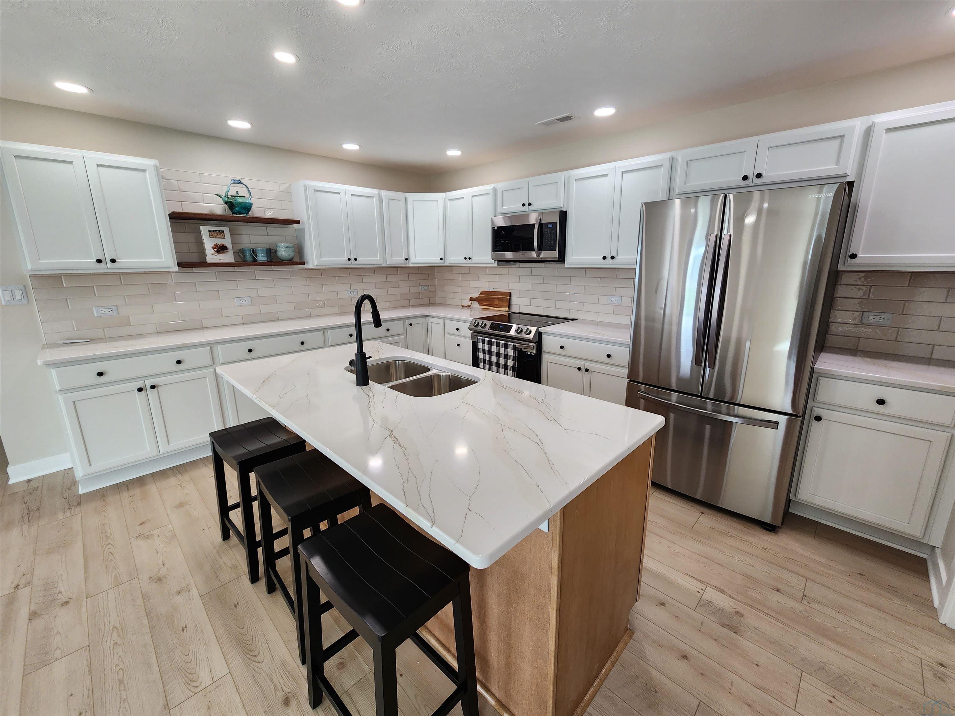 Homes For Sale at 10th St