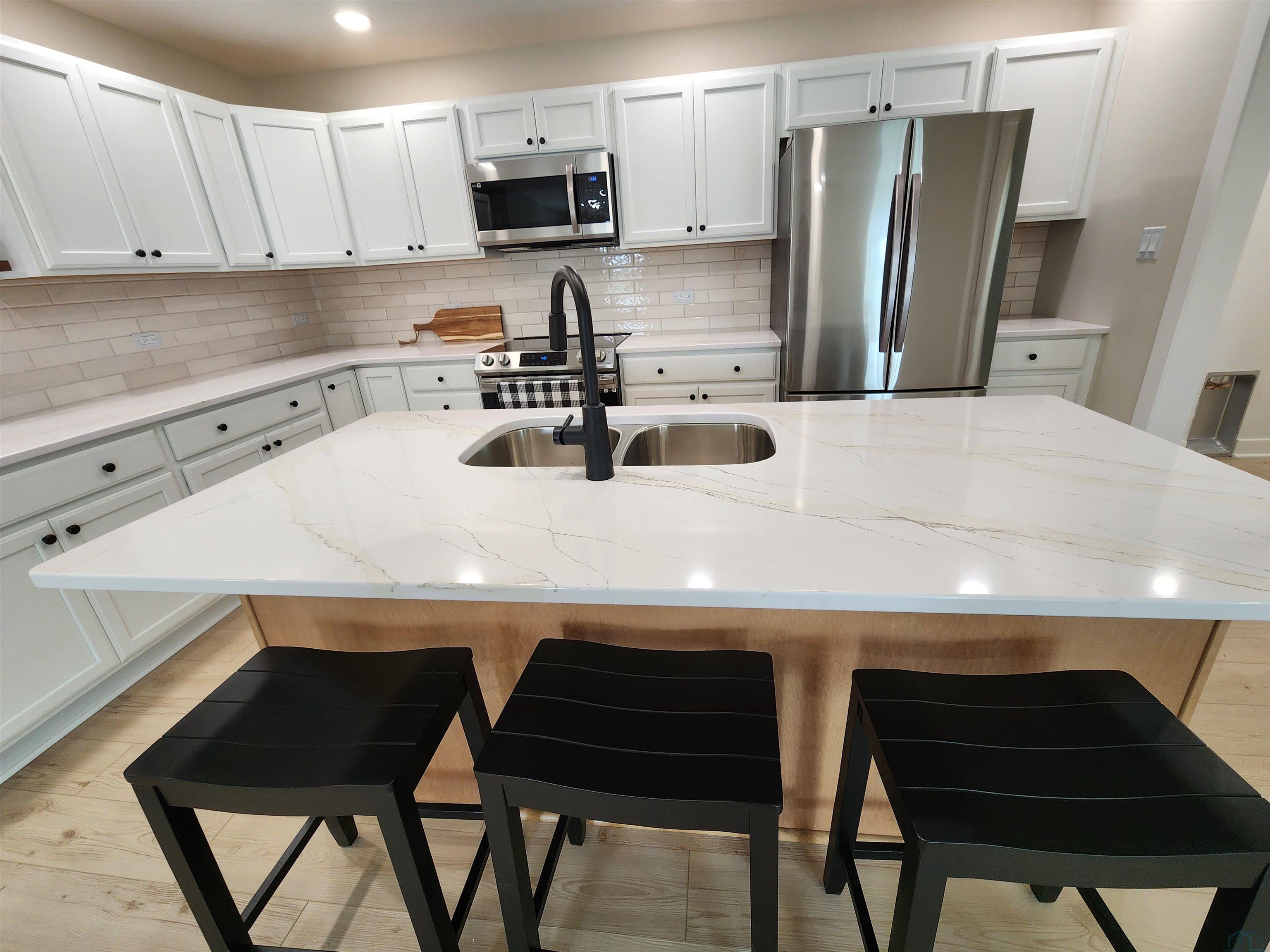 Homes For Sale at 10th St