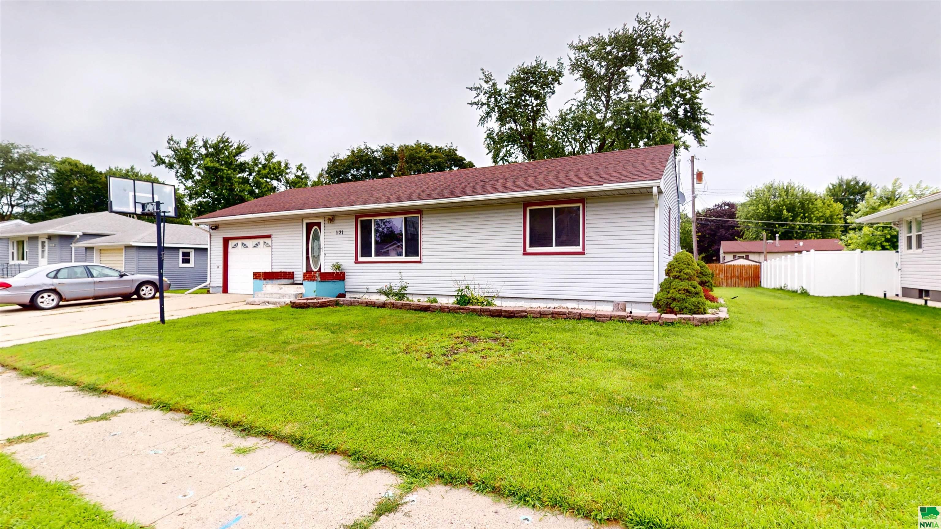 1121 SPOONER ST, Storm Lake, IA 50588 