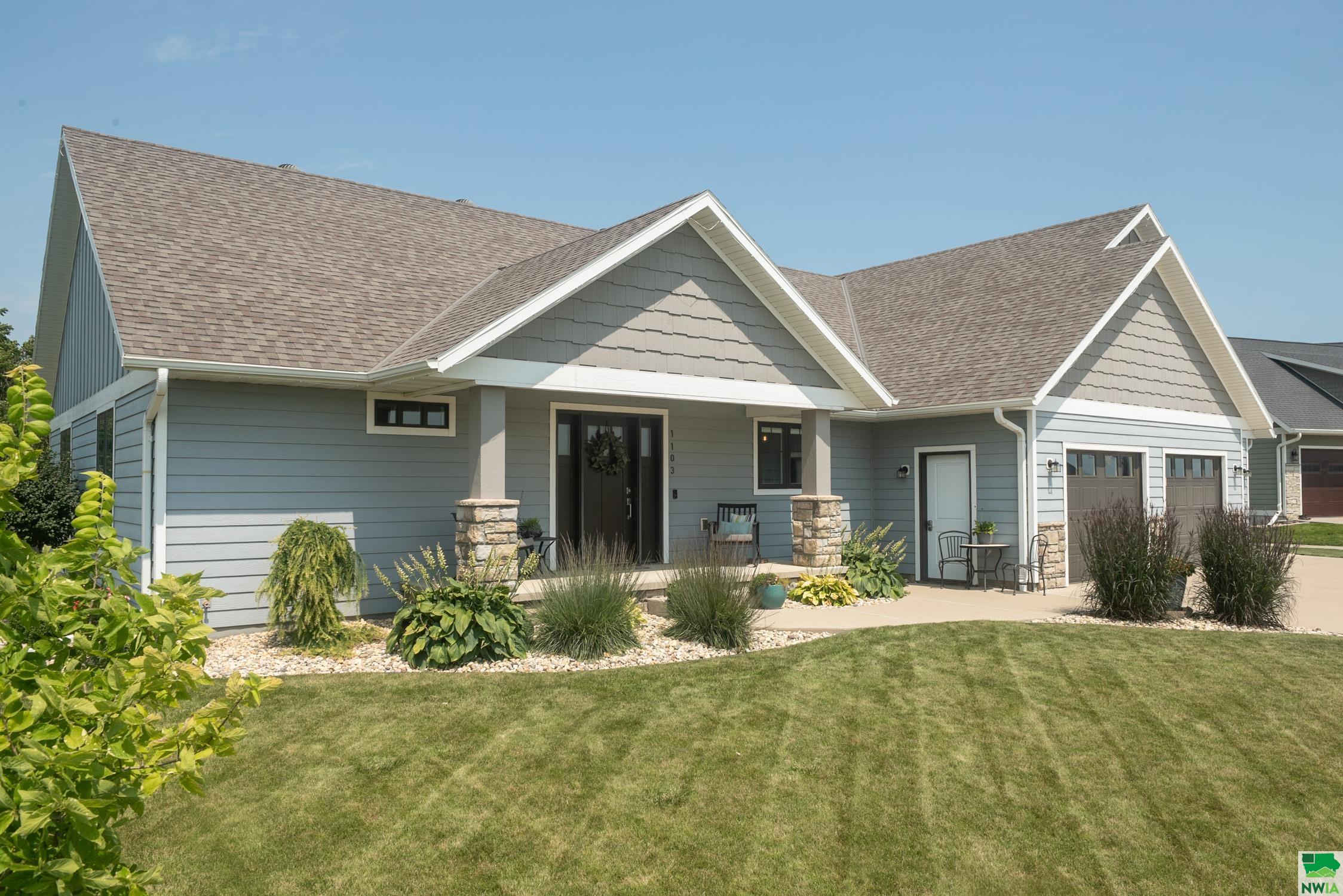 1103 13TH ST SE, Orange City, IA 51041 